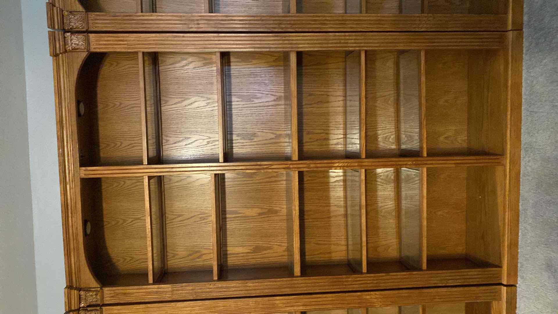 Photo 1 of OAK LIGHTED 6 SHELF BOOK CASE 48” X 13” H84” (TOTAL OF 5 AVAILABLE EACH SOLD SEPARATELY