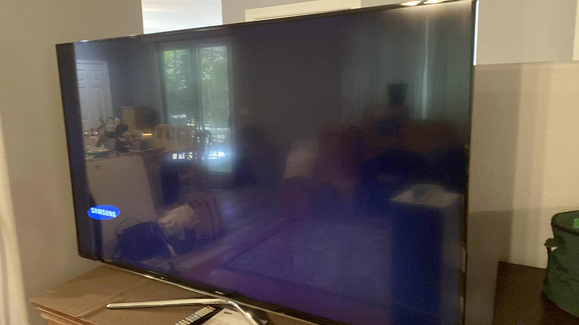 Photo 2 of SAMSUNG 65” SERIES 6 TV WITH REMOTE