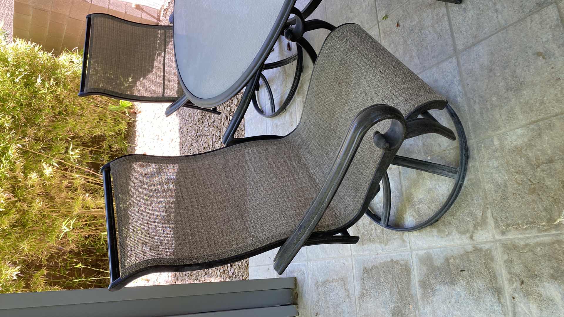 Photo 3 of GLASS AND ALUMINUM PATIO TABLE 54” WITH 4 SWIVEL CHAIRS