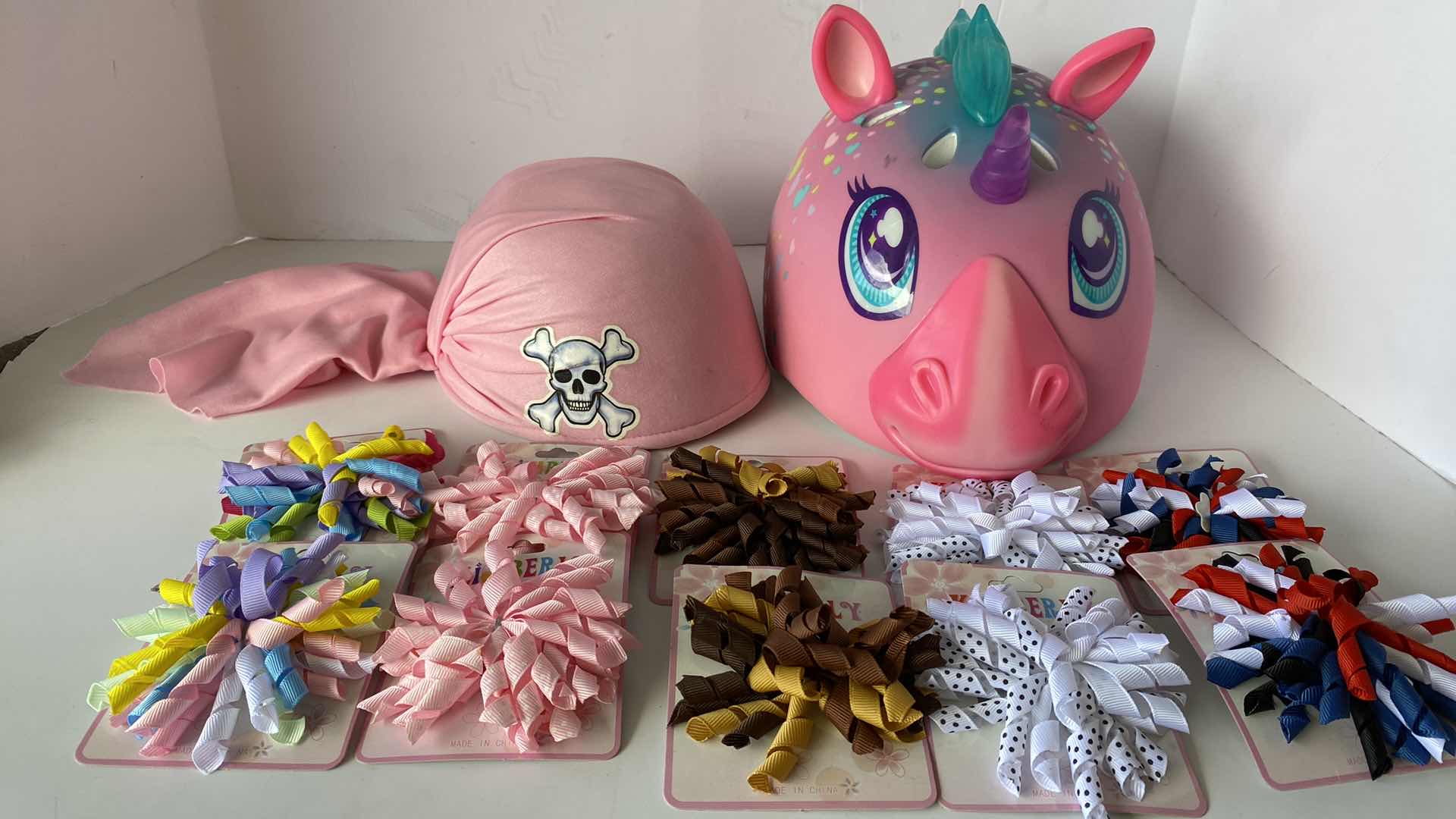 Photo 1 of BICYCLE UNICORN HELMET SIZE SMALL AGE 5 AND UP PIRATE HAT AND BARRETTES