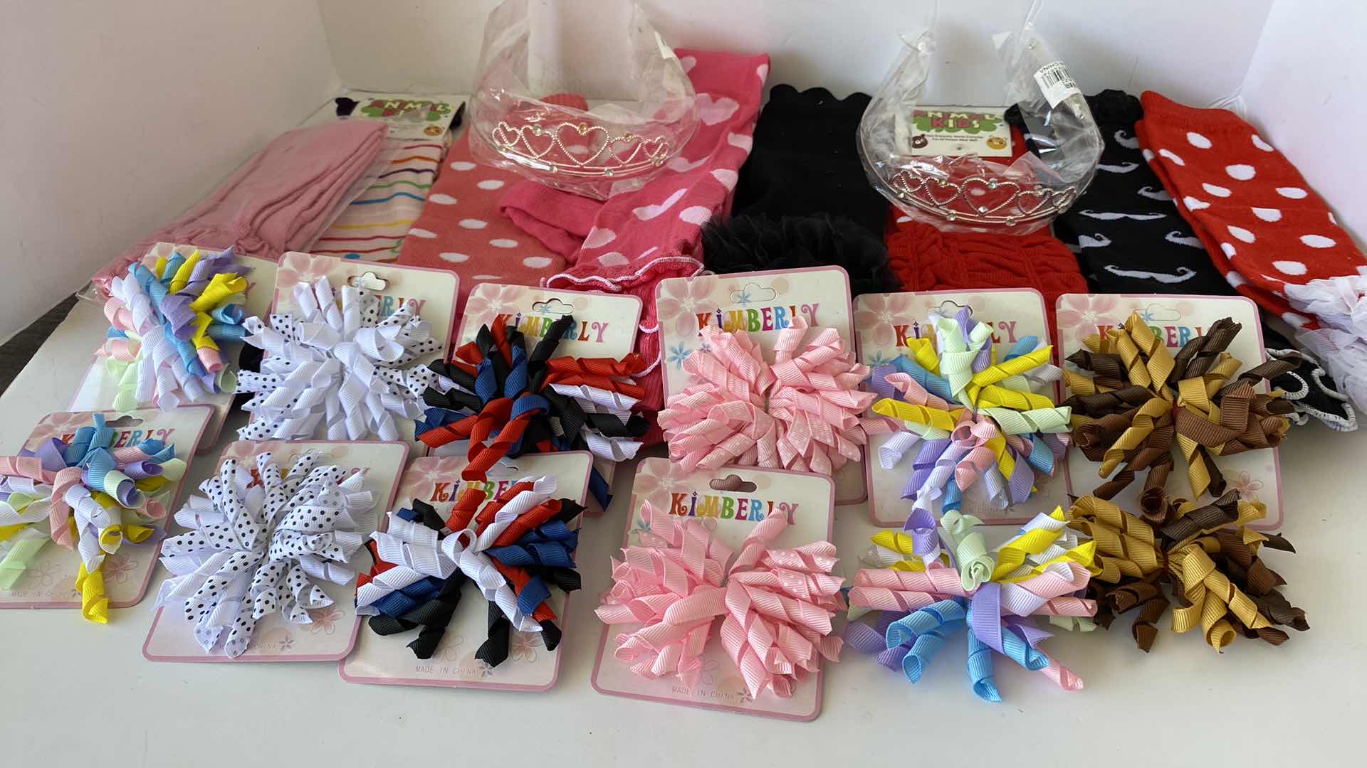 Photo 1 of GIRLS ACCESSORIES HEAD BANDS LEG WARMERS AND BARRETTES