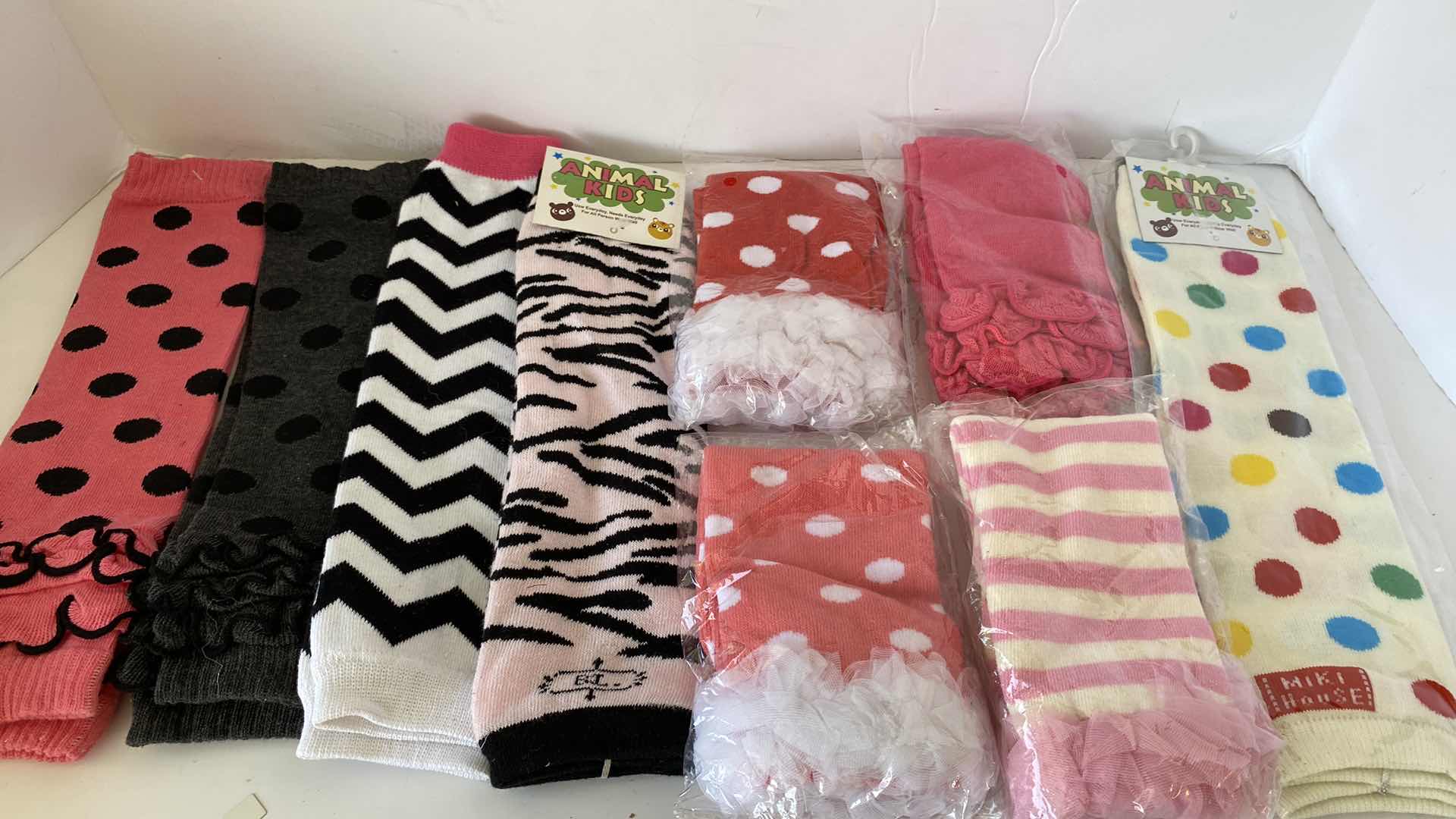 Photo 2 of GIRLS ACCESSORIES LEG WARMERS AND BARRETTES