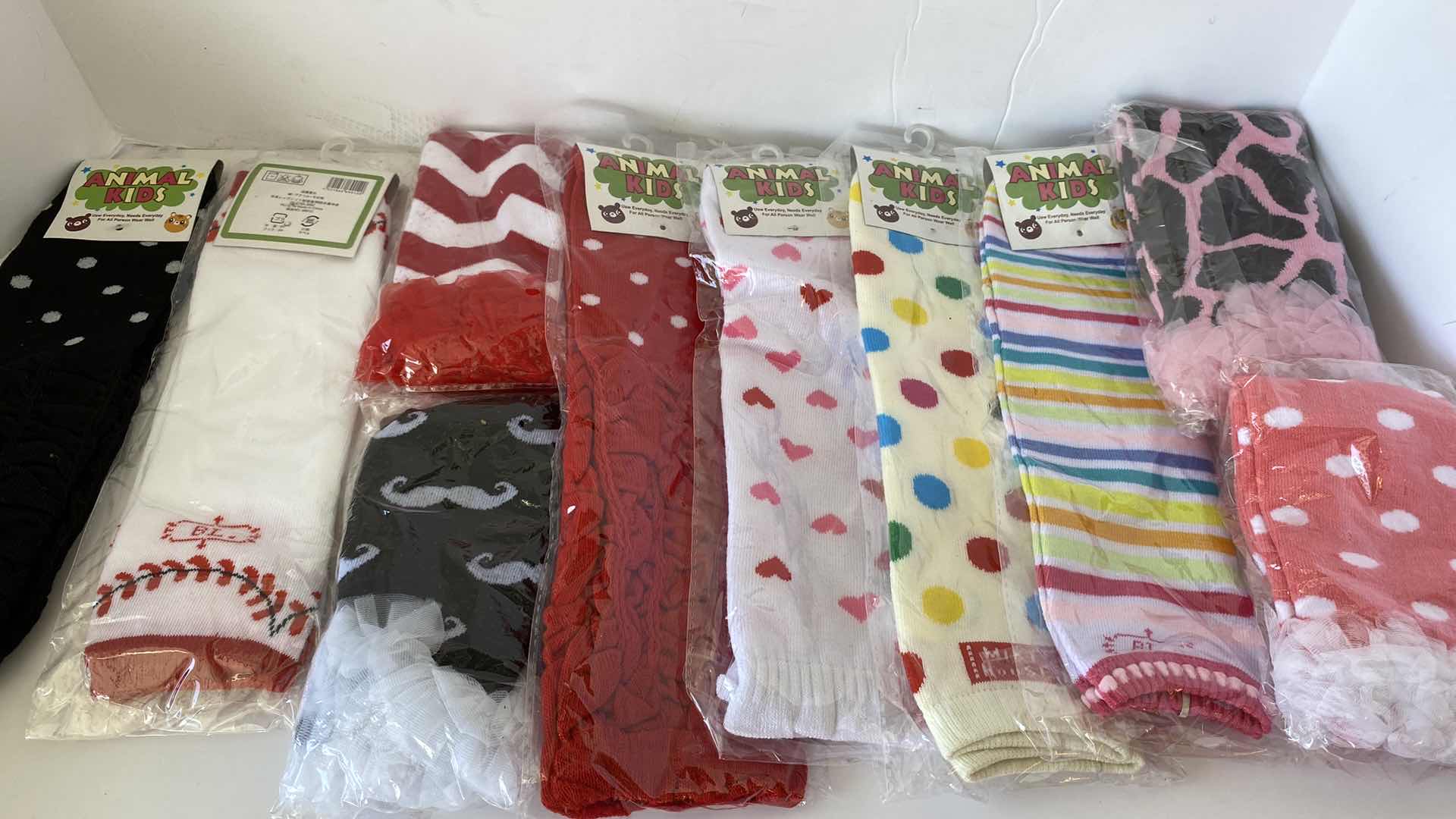 Photo 2 of GIRLS ACCESSORIES LEG WARMERS AND BARRETTES