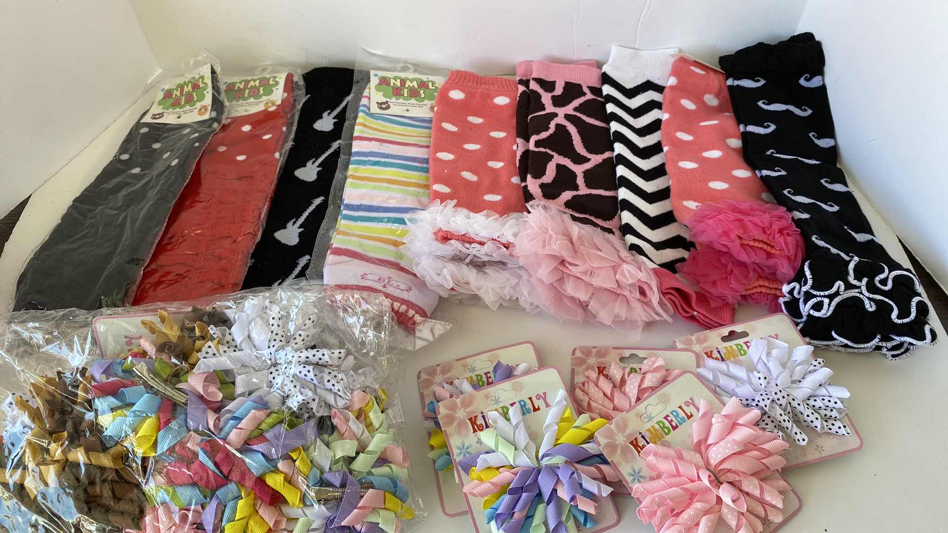 Photo 1 of GIRLS ACCESSORIES LEG WARMERS AND BARRETTES
