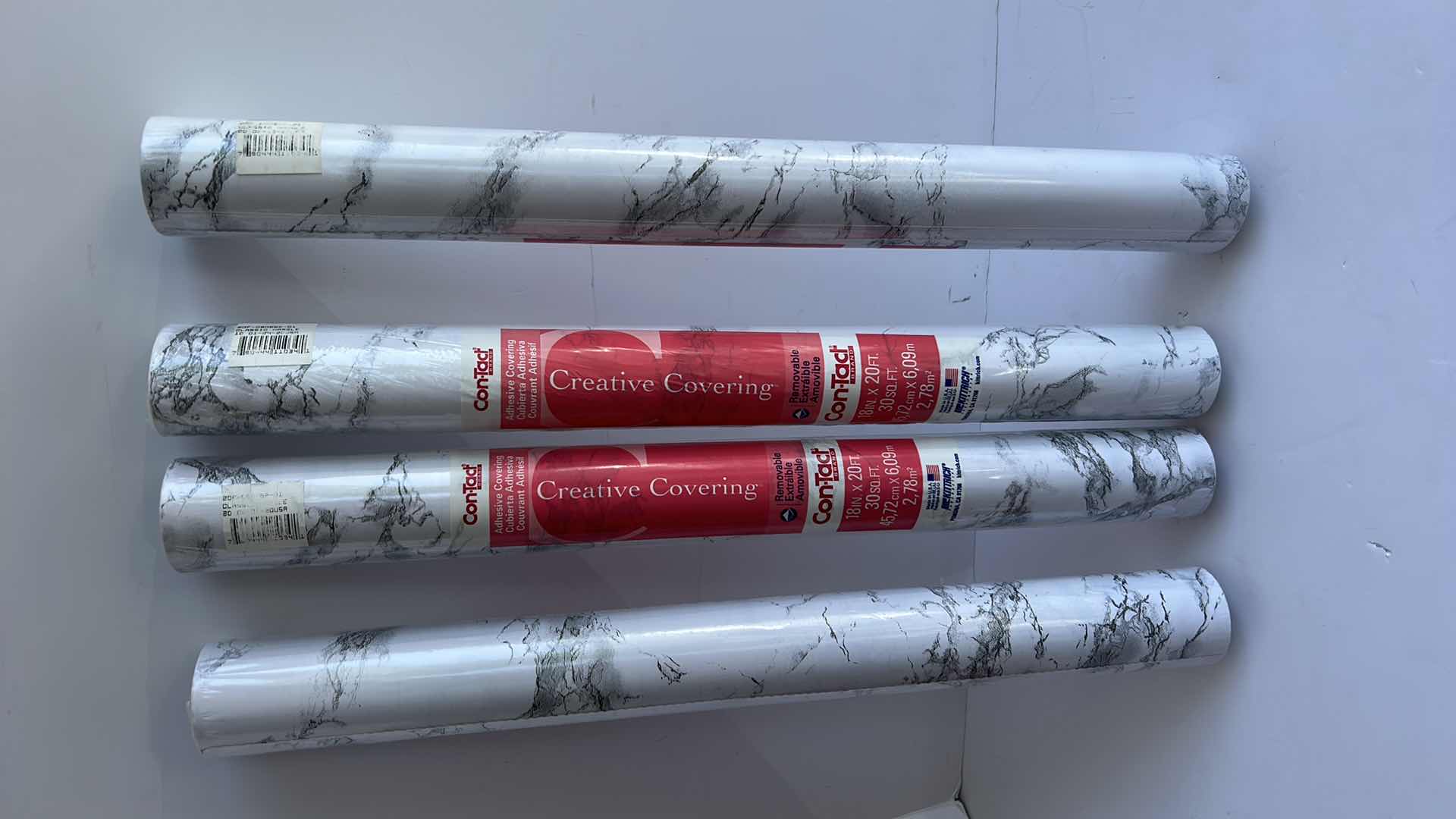 Photo 1 of 4 - NEW ROLLS REMOVABLE ADHESIVE COVERING