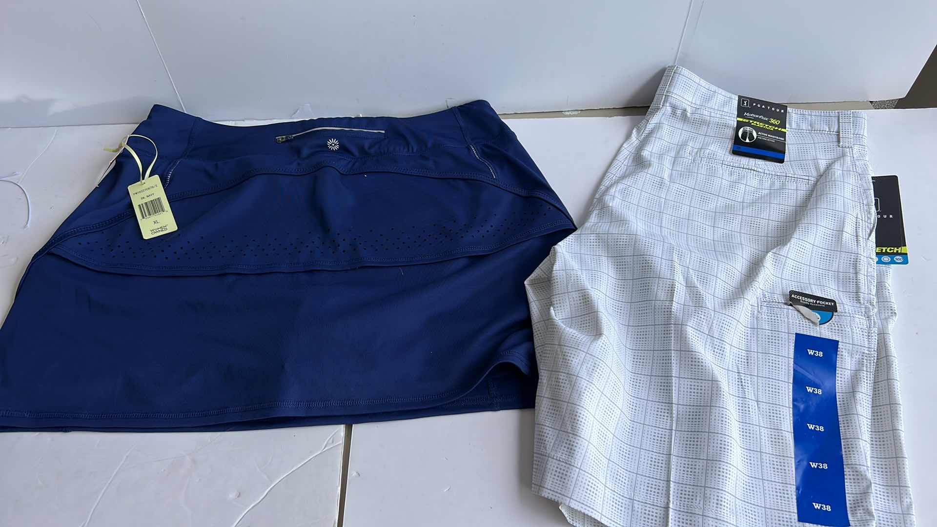 Photo 9 of NEW MEN AND WOMENS GOLF SHORTS AND SKORT