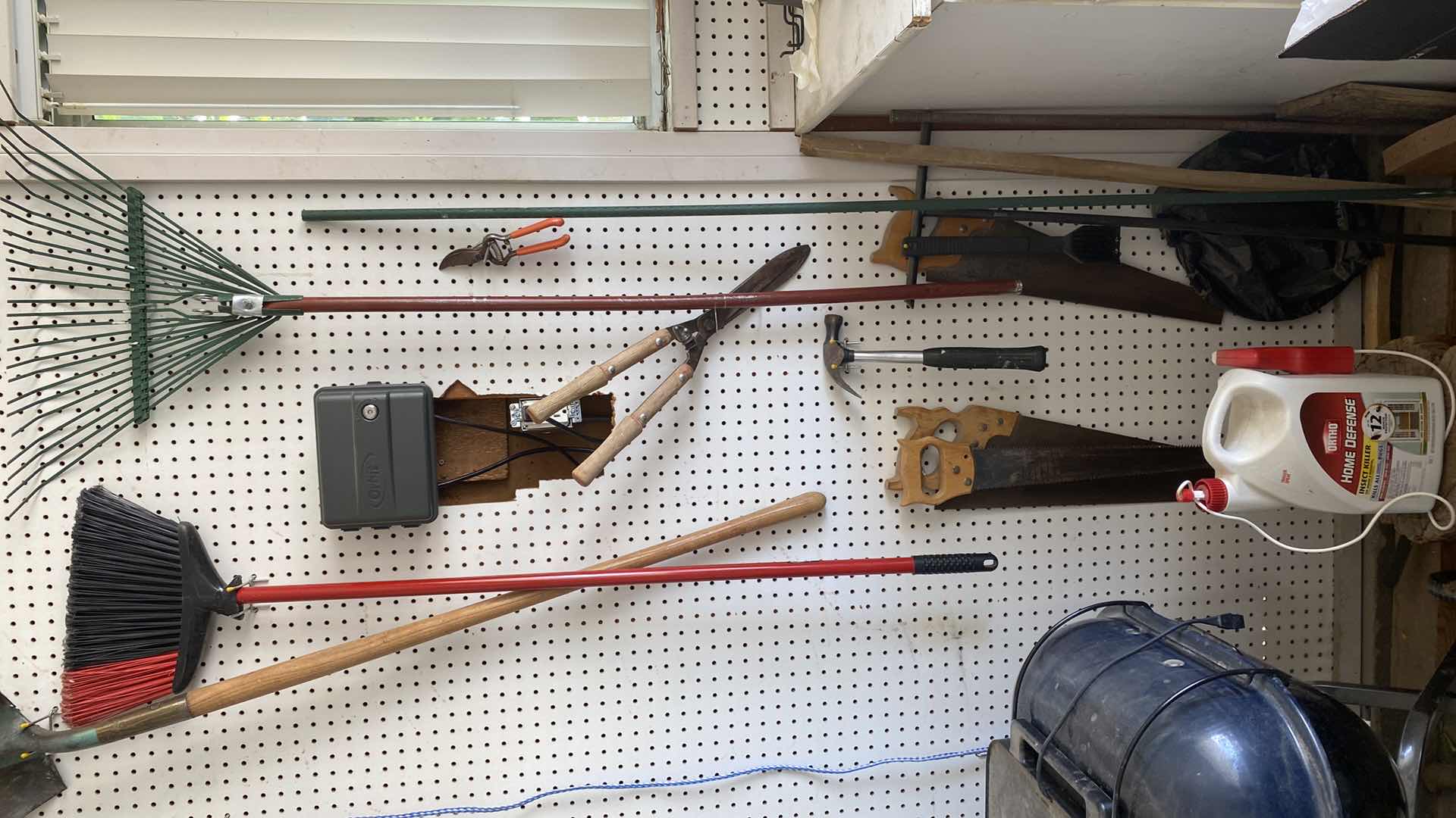 Photo 1 of HANGING TOOLS ON PEGBOARD AND INSECT KILLER