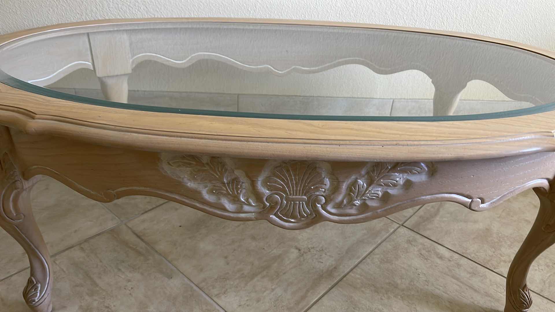 Photo 3 of WOOD AND GLASS OVAL COFFEE TABLE 48” X 28” H 16”