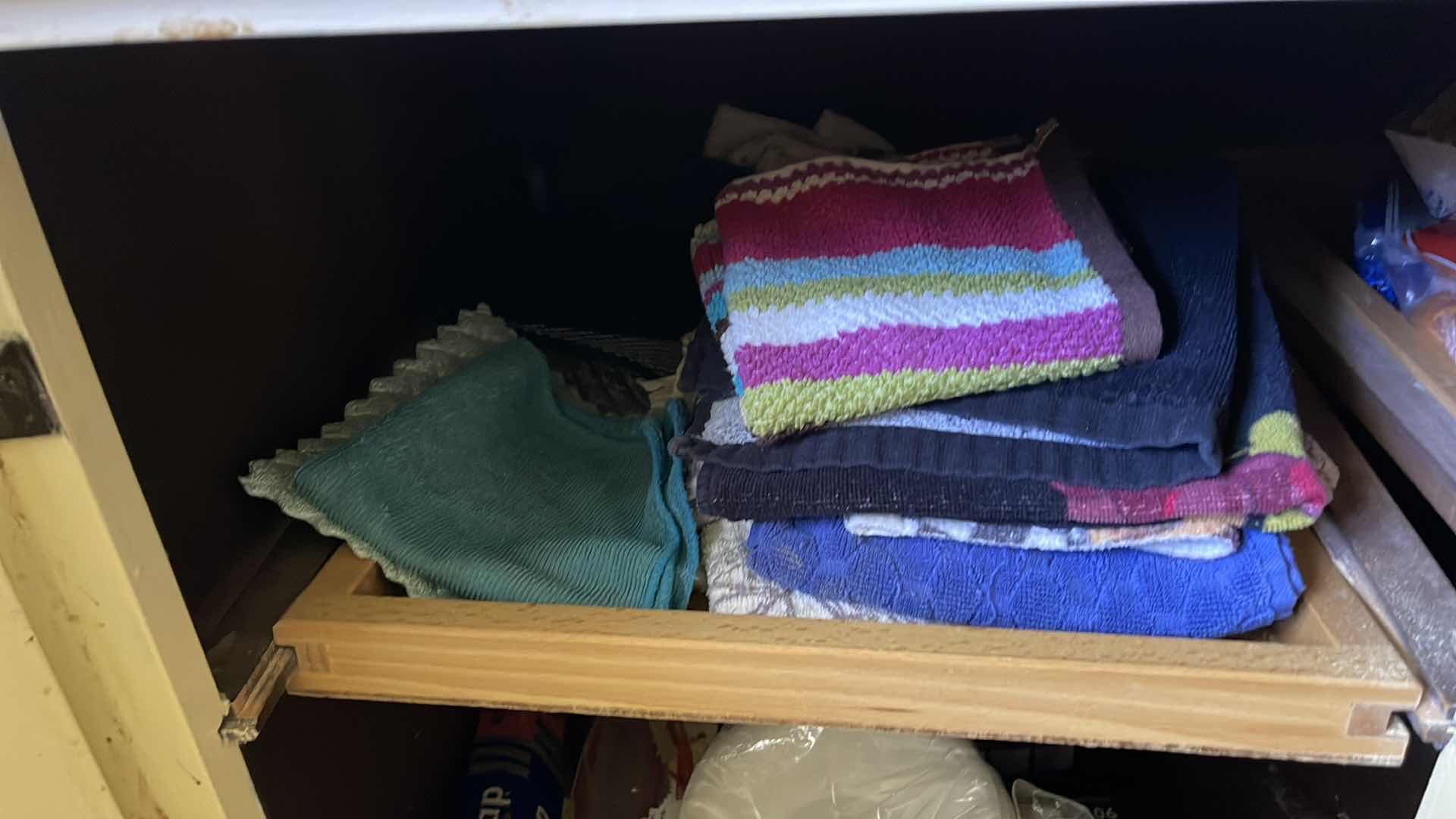 Photo 2 of CONTENTS OF CUPBOARD, DISHTOWELS, PLASTIC STORAGE BAGS