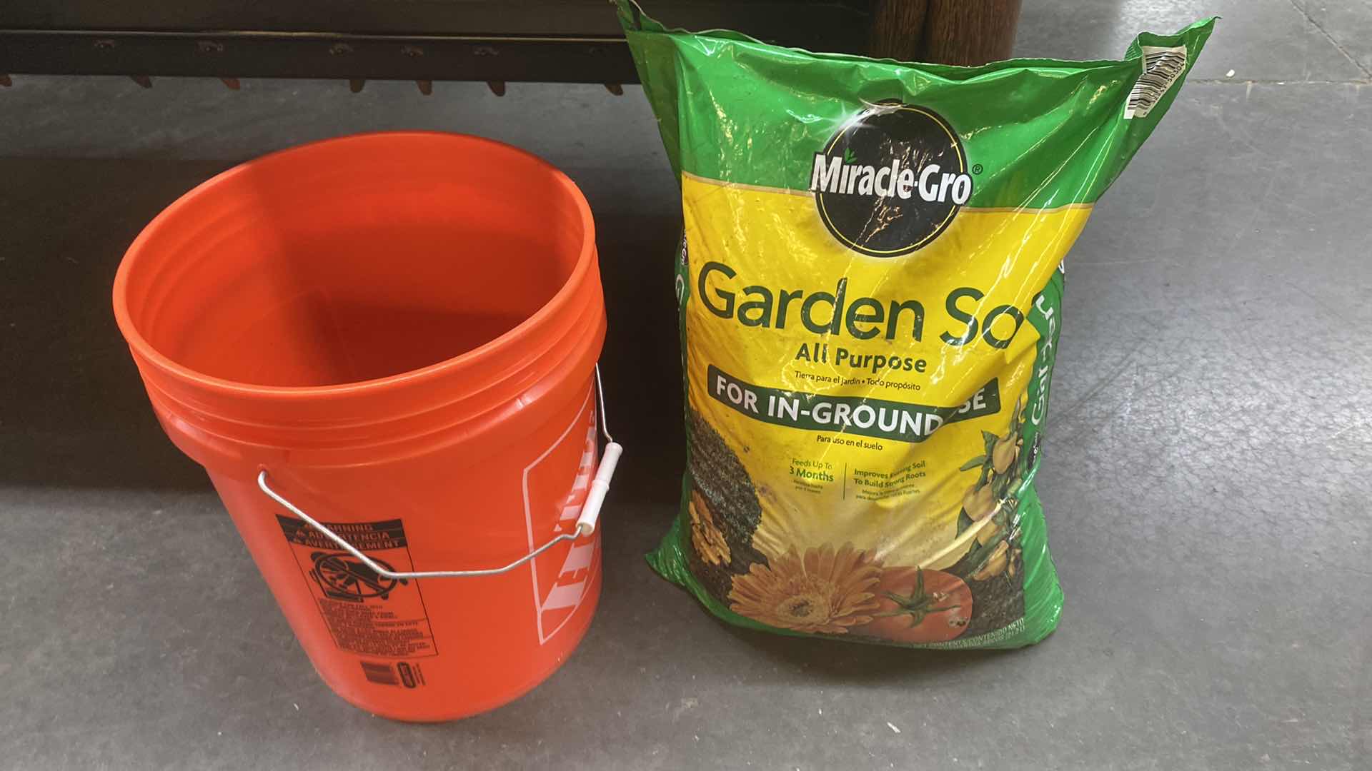 Photo 1 of BUCKET AND MIRACLE GROW GARDEN SOIL UNOPENED