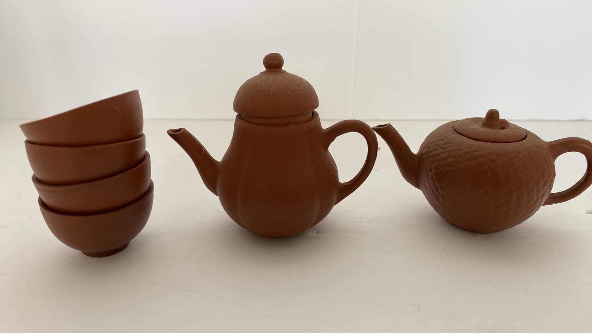 Photo 1 of PAIR OF VINTAGE CHINESE COLLECTIBLE CLAY TEA POTS WITH 4 TEA CUPS LARGEST TEAPOT 3” x 2”