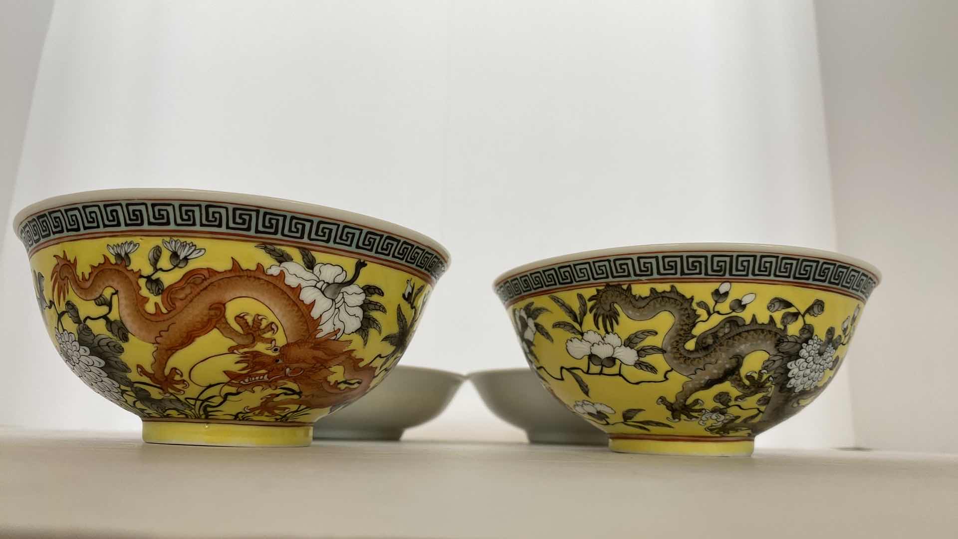 Photo 2 of CHINESE YELLOW GROUND FAMILLE ROSE PAIR OF DRAGON BOWLS 5” AND PAIR OF PLATES 5.375” SEE REIN MARK