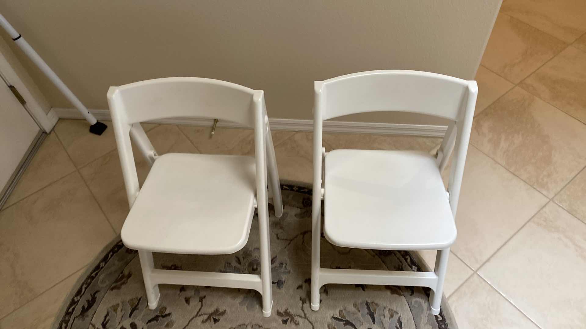 Photo 2 of PAIR OF PLASTIC FOLDING CHAIRS