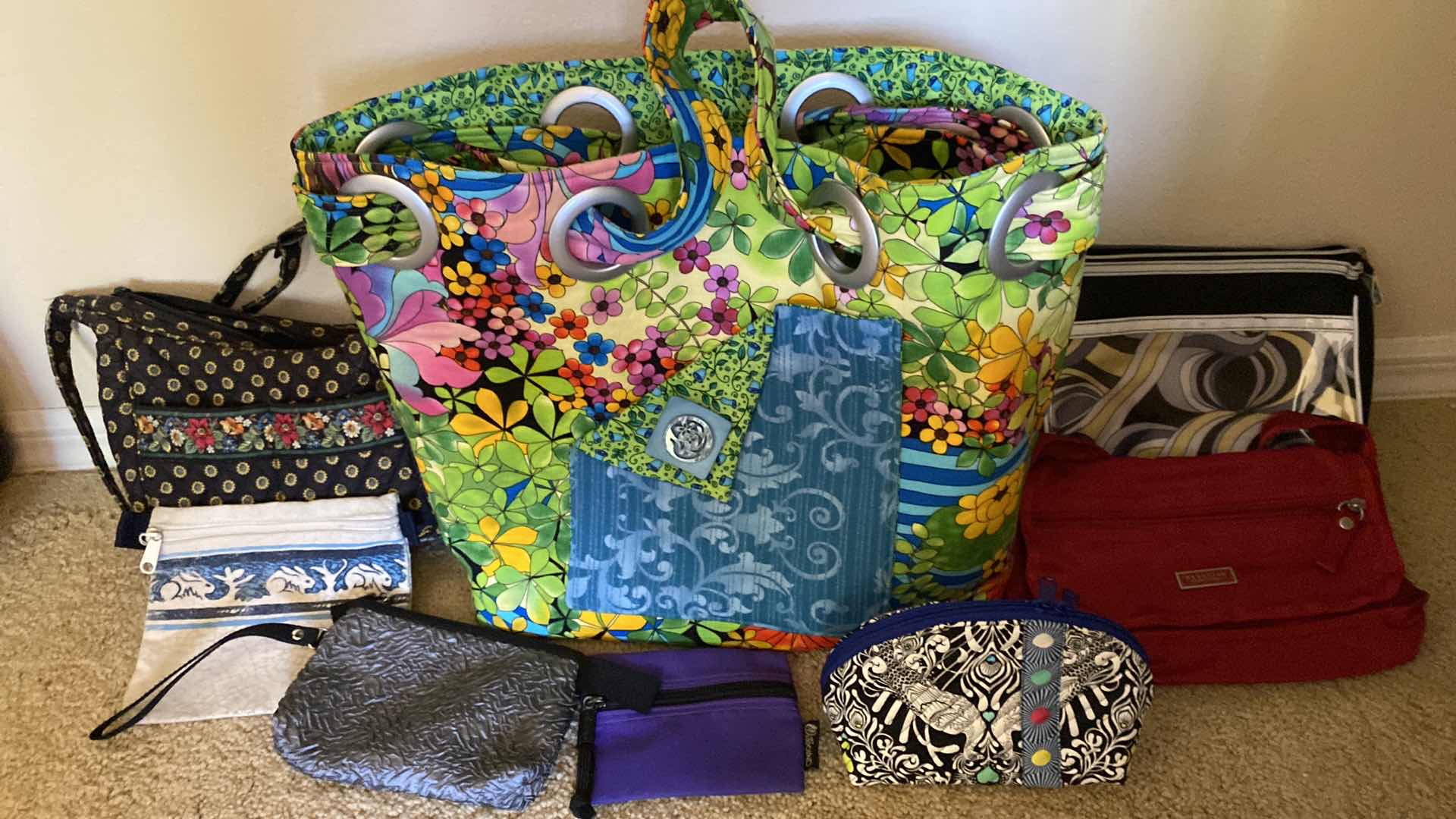 Photo 1 of Bright floral tote 16” X 14” and light weight bags