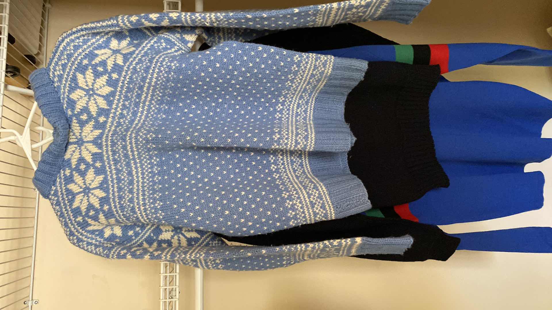 Photo 4 of 3 -  wool sweaters no sizes indicated, estimated one women’s medium and two men’s large