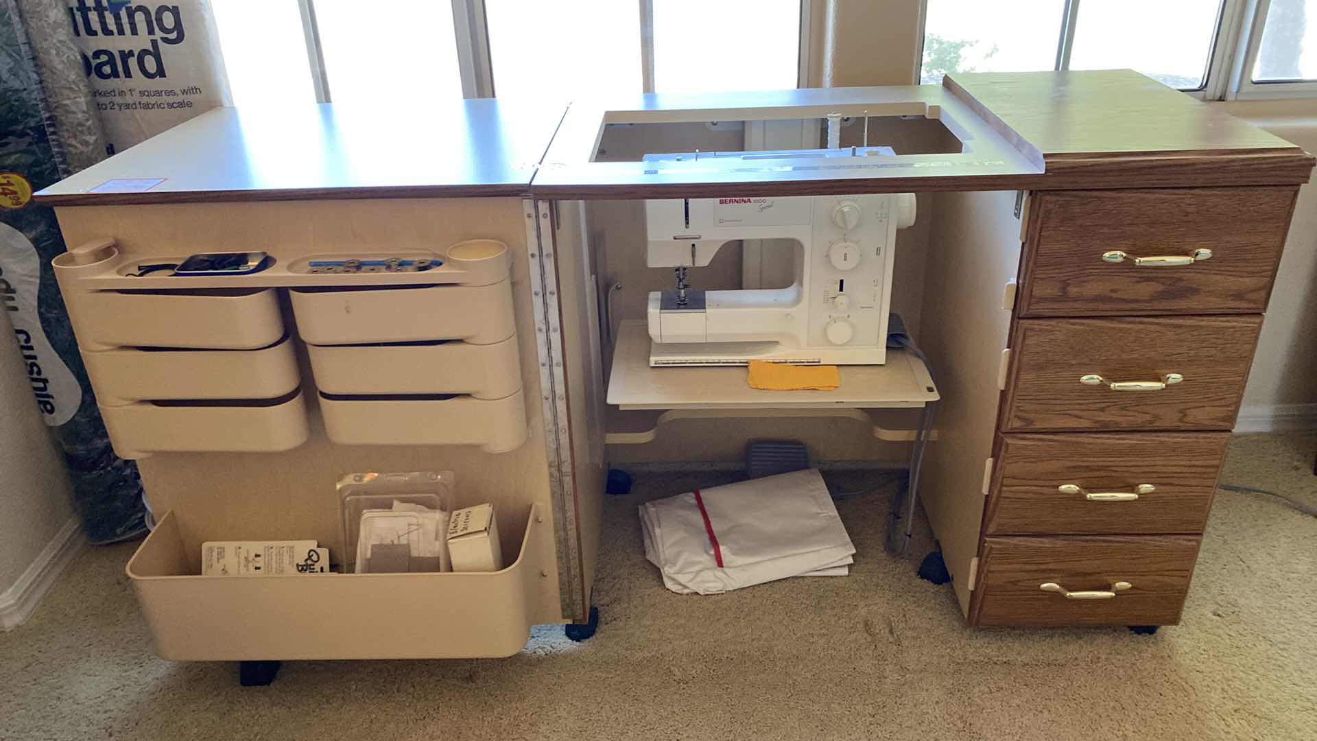 Photo 1 of BERNINA 1000 sewing machine in built in cabinet with storage