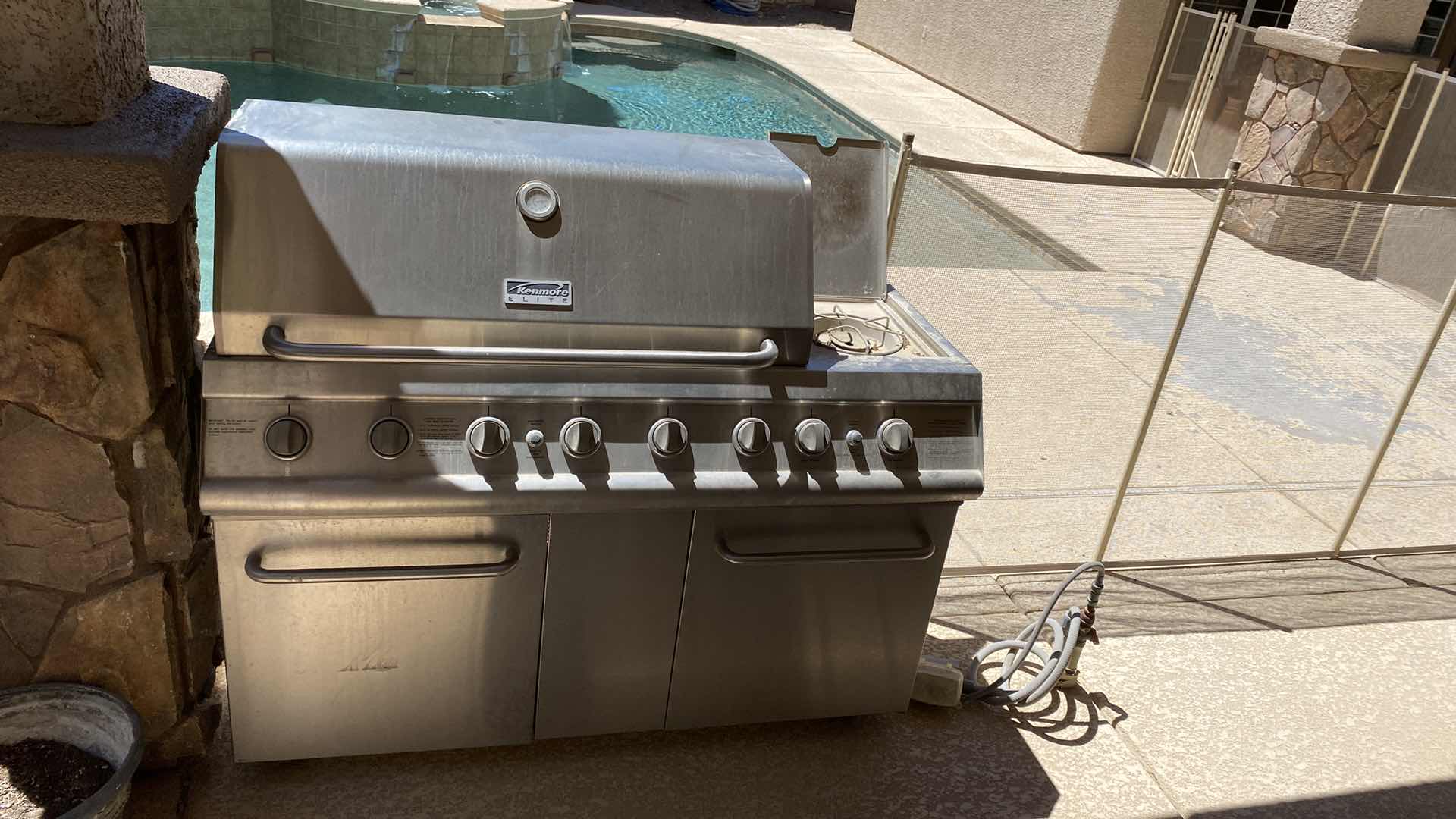 Photo 2 of KENMORE ELITE GRILL WITH SIDE BURNER AND STORAGE 56“ x 25“ H 51“