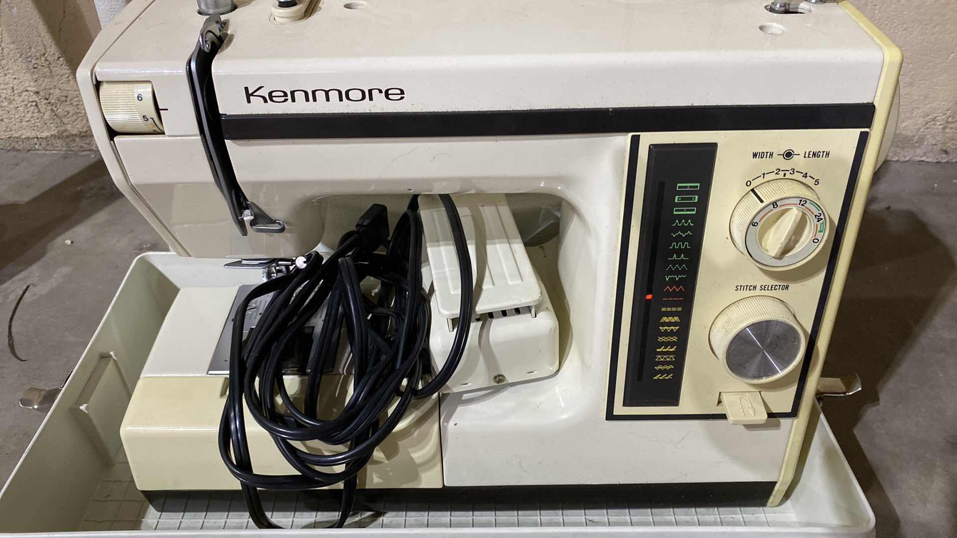 Photo 2 of KENMORE SEWING MACHINE WITH CASE