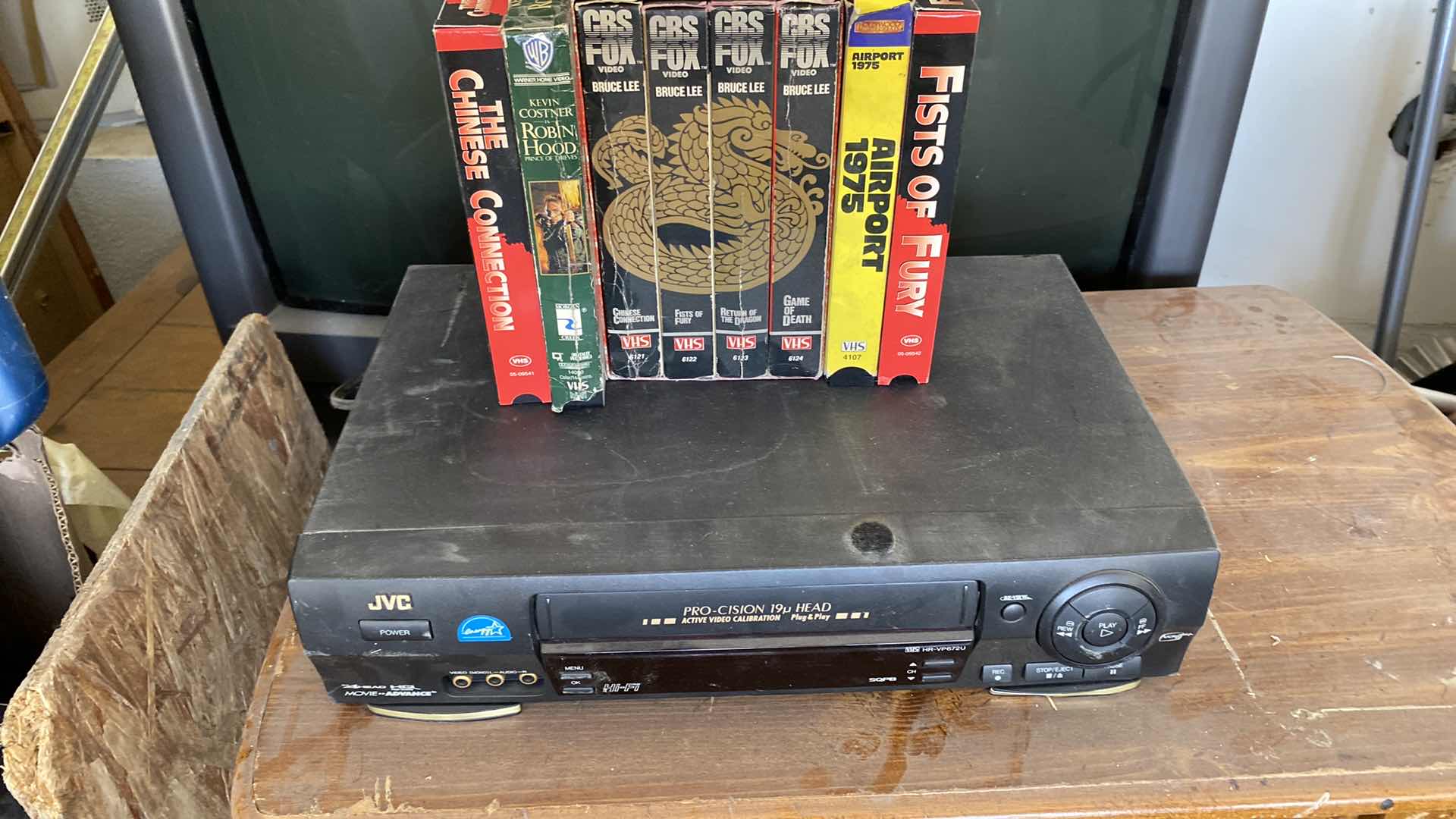 Photo 4 of JVC VCR AND ASSORTED ACTION MOVIES