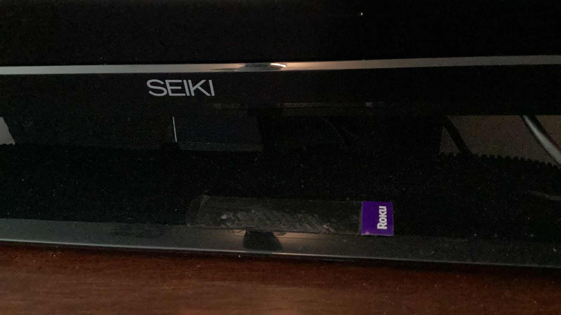 Photo 2 of SEIKI ROKU 32” TV WITH REMOTE