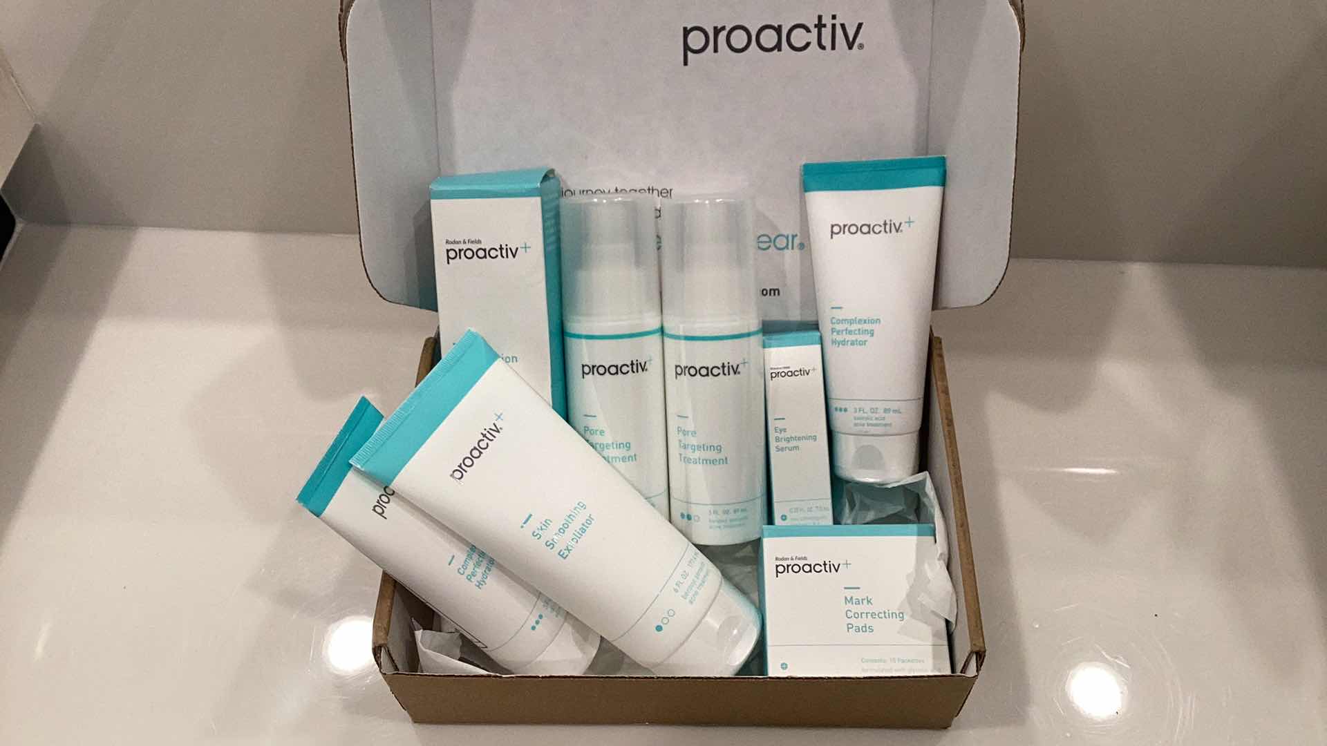 Photo 4 of PROACTIVE THIS PRODUCT IS EXPIRED BUT ITS SEALED FROM FACTORY IT INCLUDES COMPLEXION PERFECTING HYDRATOR, SKIN SMOOTHING EXFOLIATOR, MARK CORRECTING PADS, EYE BRIGHTENING SERUM, AND OTHER SKIN ESSENTIALS FOR EVERYDAY ROUTINE.