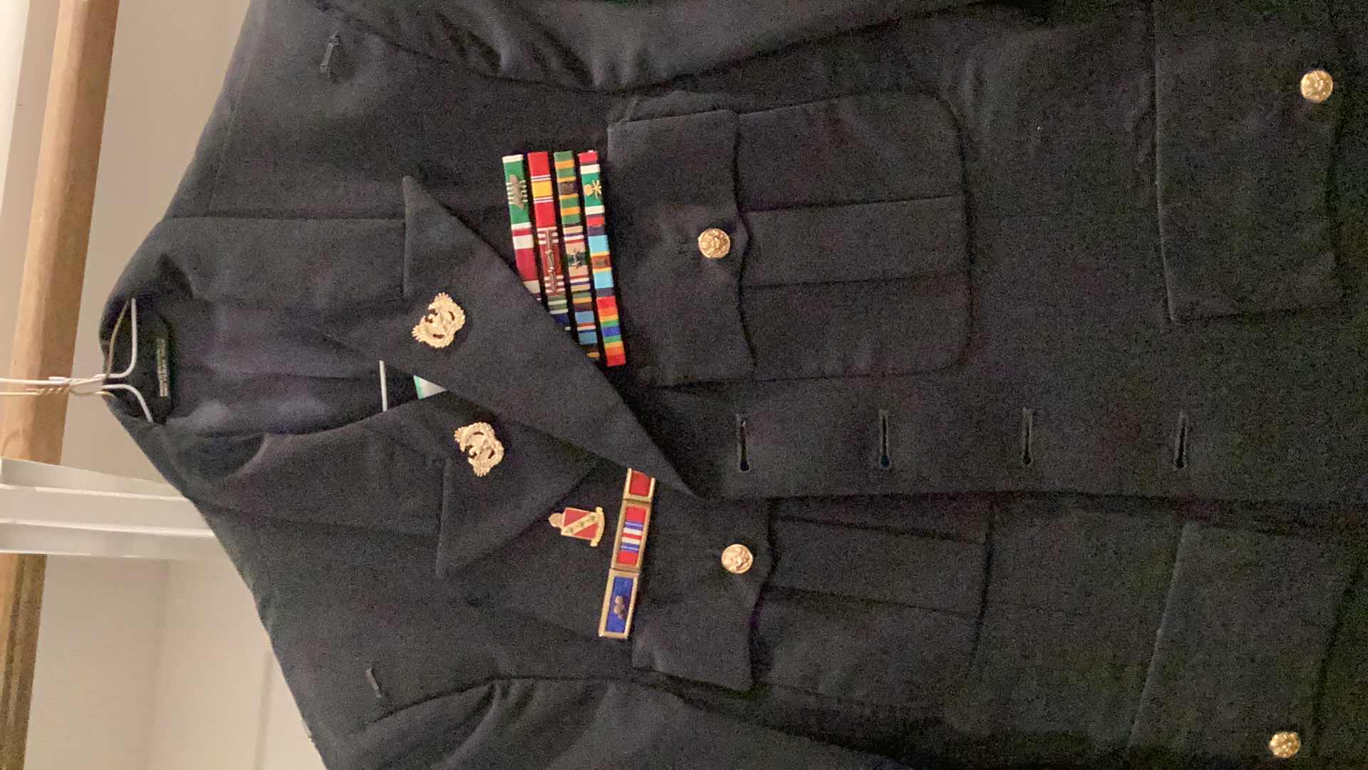 Photo 2 of AUTHENTIC MILITARY DRESS SUITE WITH BADGES AND SUSPENDERS.