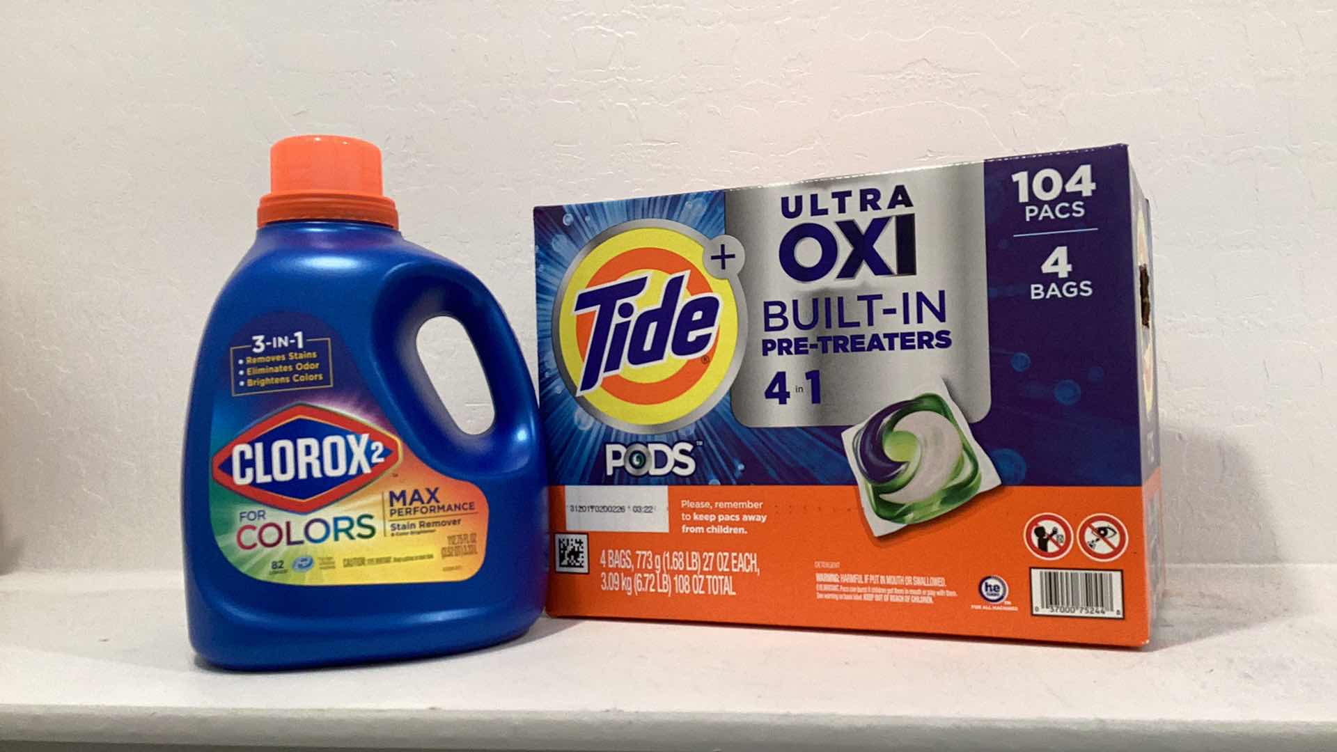 Photo 1 of CLOROX LAUNDRY DETERGENT LASTING FOR 82 LOADS AND TIDE PODS WITH 104 PACKS.