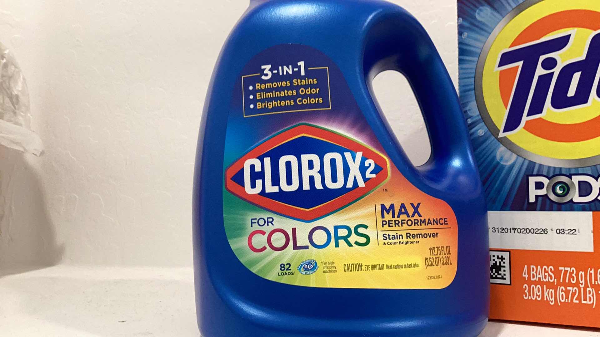 Photo 2 of CLOROX LAUNDRY DETERGENT LASTING FOR 82 LOADS AND TIDE PODS WITH 104 PACKS.