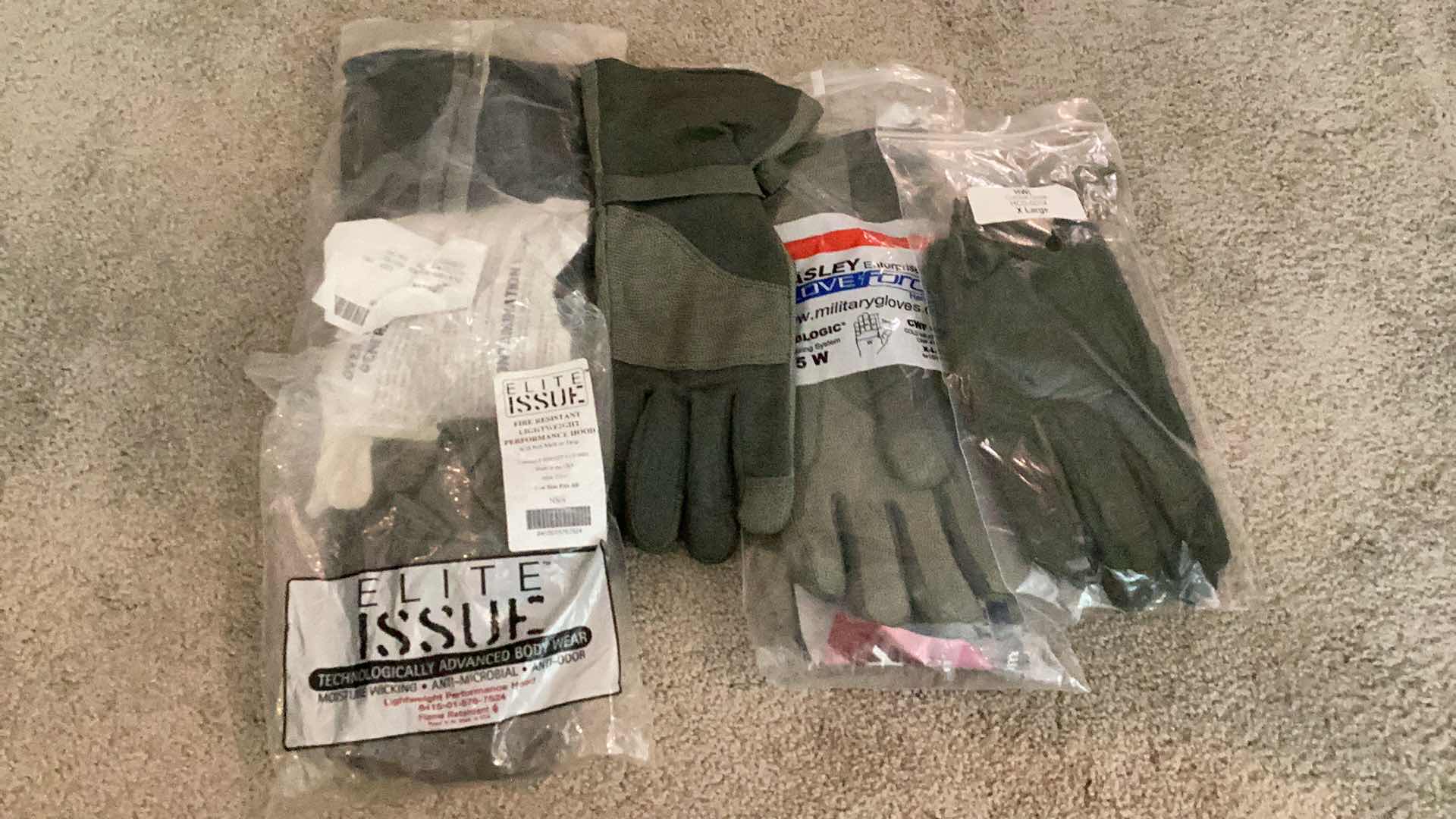 Photo 1 of MILITARY AUTHENTIC GRADE GLOVES AND HOOD.