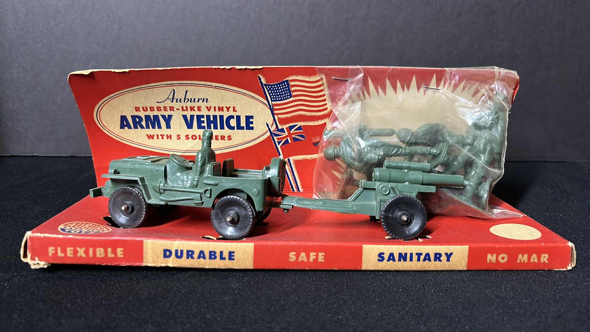 Photo 1 of AUBURN TOYS RUBBER-LIKE VINYL ARMY VEHICLE W SOLDIERS (No. 318 JEEP AND GUN W 5 SOLDIERS)