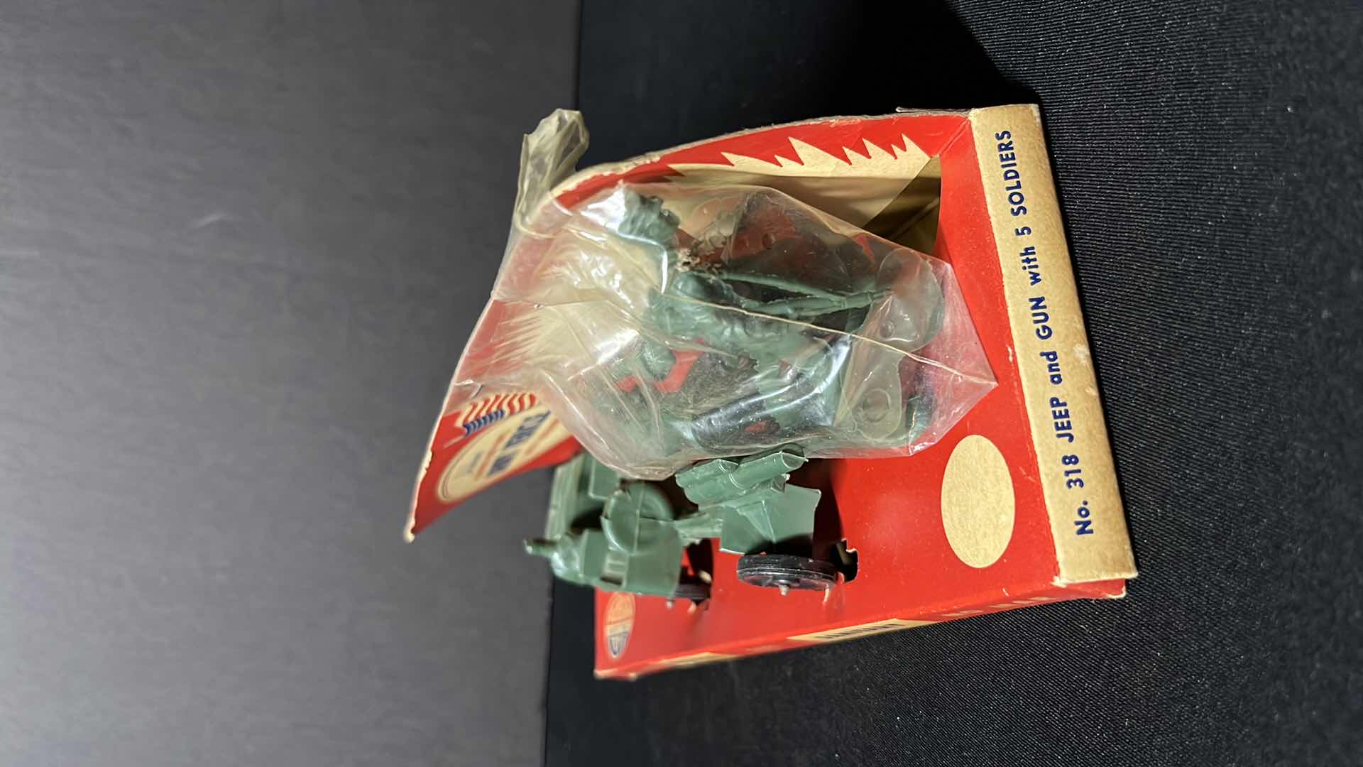 Photo 2 of AUBURN TOYS RUBBER-LIKE VINYL ARMY VEHICLE W SOLDIERS (No. 318 JEEP AND GUN W 5 SOLDIERS)