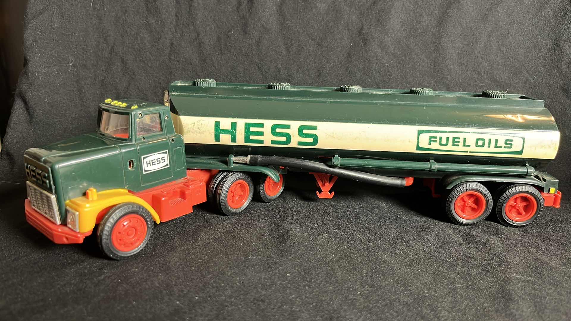 Photo 1 of 1984 HESS BATTERY OPERATED TANKER TRUCK BANK (H1984), TRACTOR IS MISSING PLASTIC CHROME PIECES, NO BOX