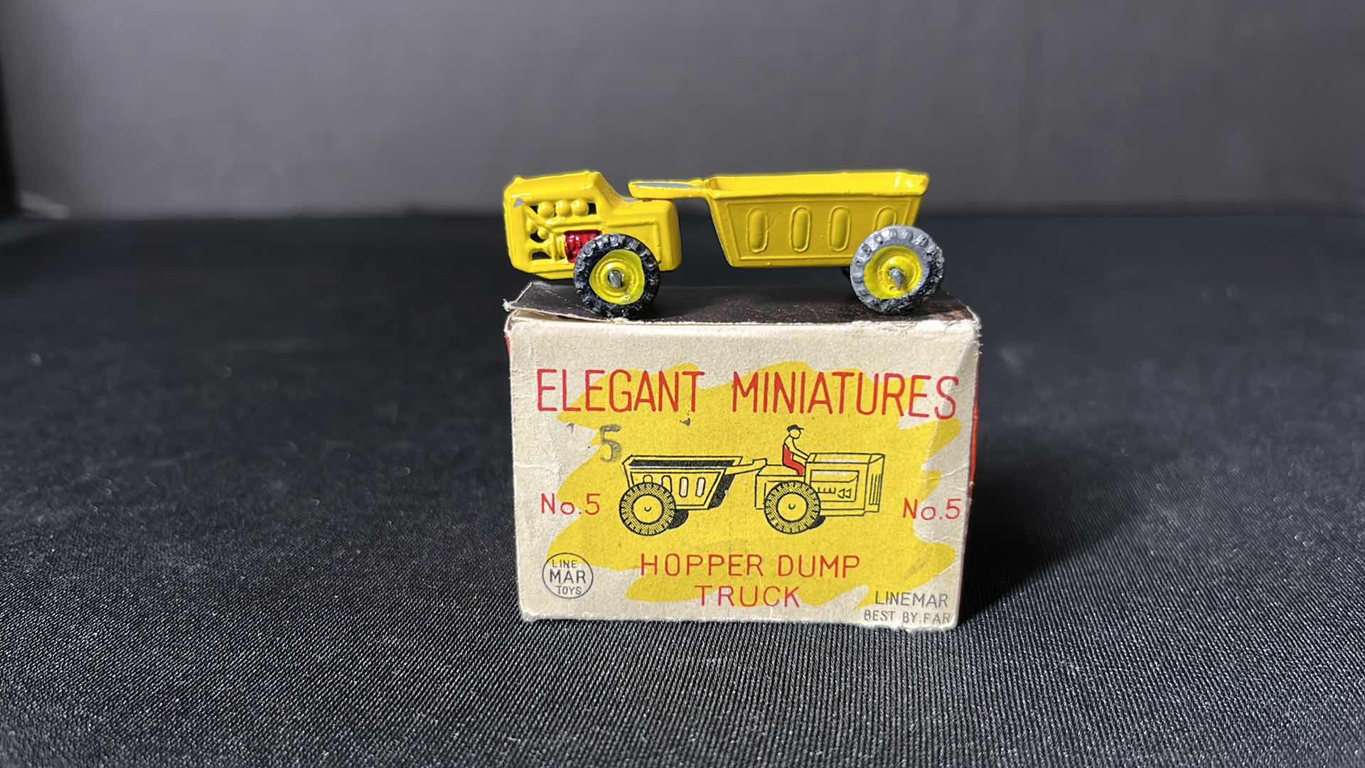 Photo 1 of LINEMAR TOYS ELEGANT MINIATURES 2” HOPPER DUMP TRUCK (No. 5)