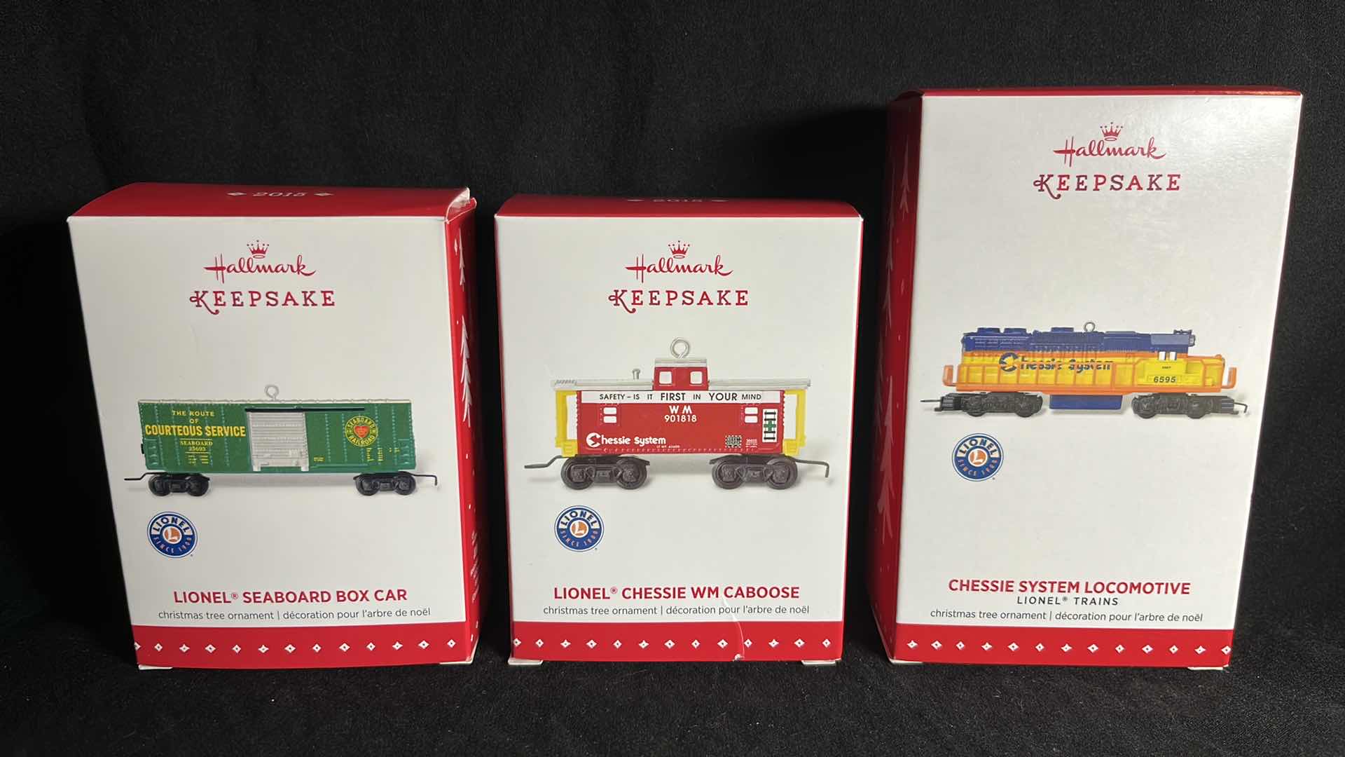 Photo 1 of HALLMARK LIONEL TRAIN DIE-CAST METAL KEEPSAKE ORNAMENTS SEABOARD BOX CAR 2015 (#QXI2537), CHESSIE WM CABOOSE 2015 (#QXI2539) & CHESSIE SYSTEM LOCOMOTIVE 2015 (#QX9047)