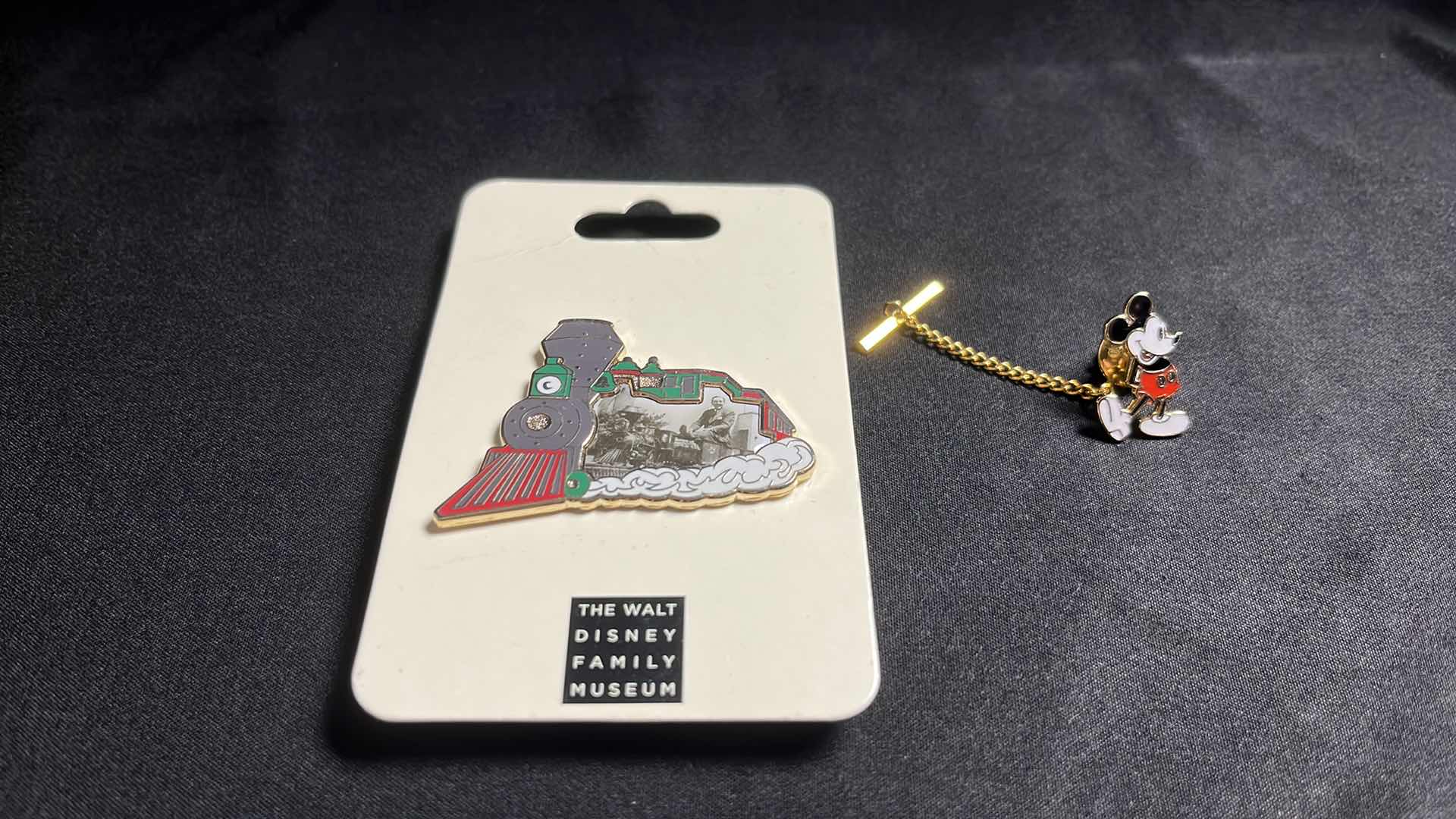 Photo 1 of WALT DISNEY COLLECTIBLE TRAIN PIN AND MICKEY MOUSE TIE TACK
