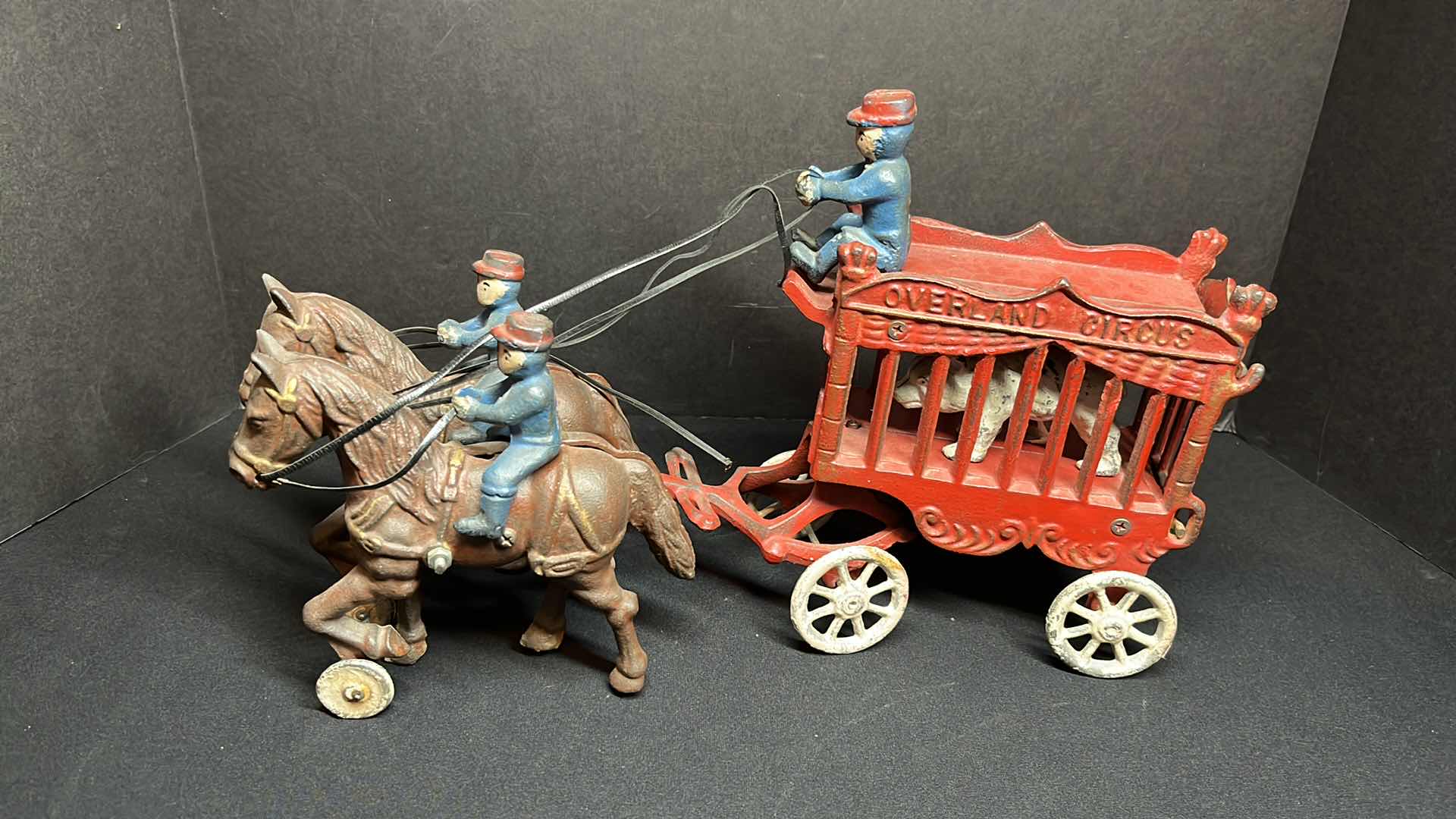 Photo 1 of VINTAGE 2PC- CAST IRON 2 HORSE DRAWN OVERLAND CIRCUS WAGON W 4 FIGURINES