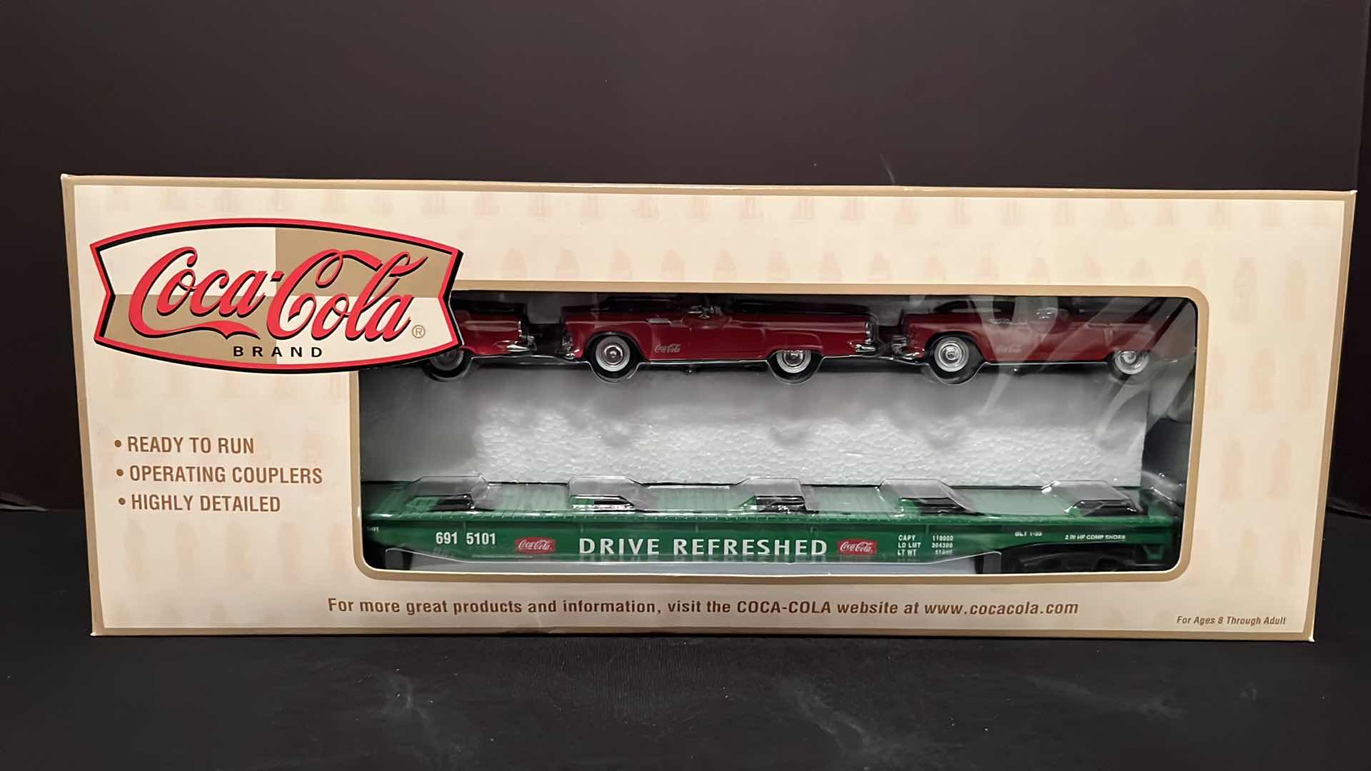 Photo 1 of K-LINE ELECTRIC TRAINS COCA-COLA BRAND FREIGHT CAR FLAT CAR W 3 FORD T-BIRDS (ITEM K691-5101)