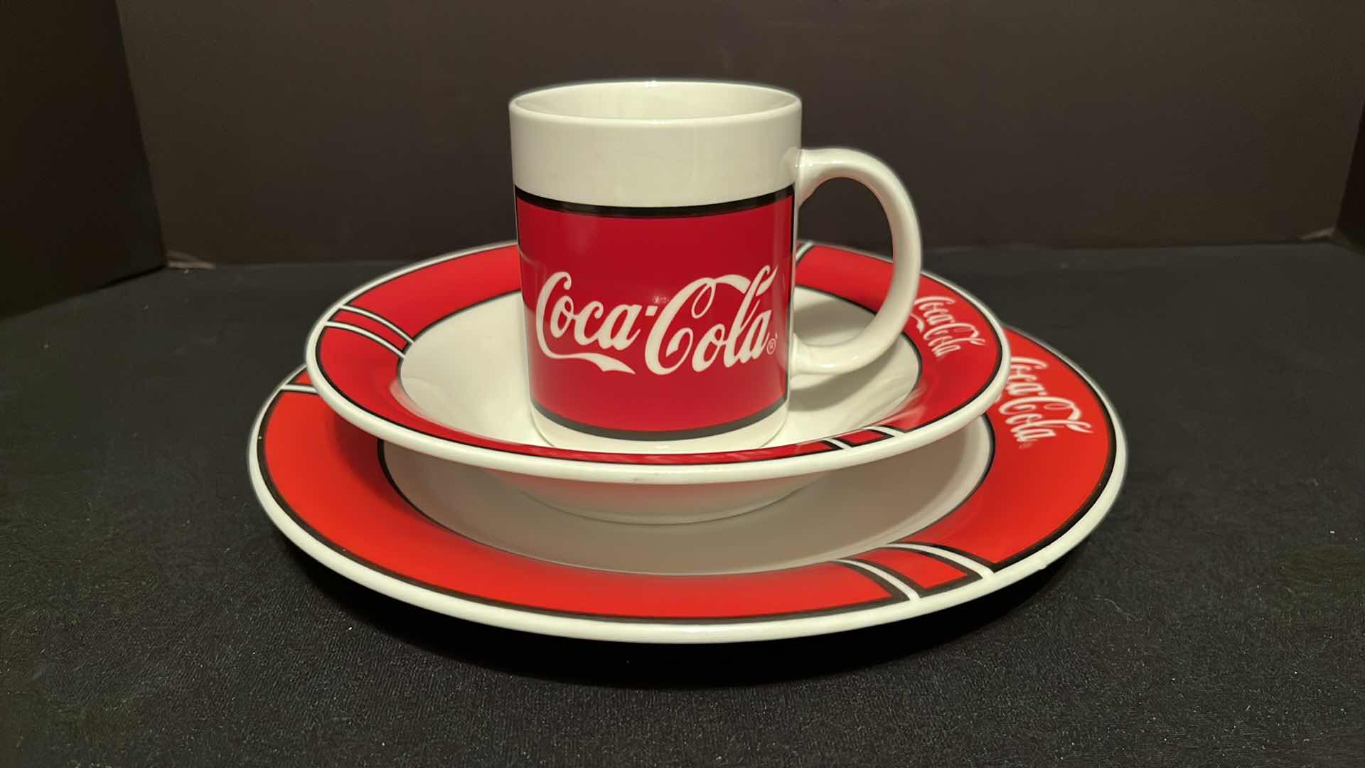 Photo 1 of GIBSON HOUSEWARES COCA-COLA BRAND DINNERWARE & MUGS 3PC SET, 1997