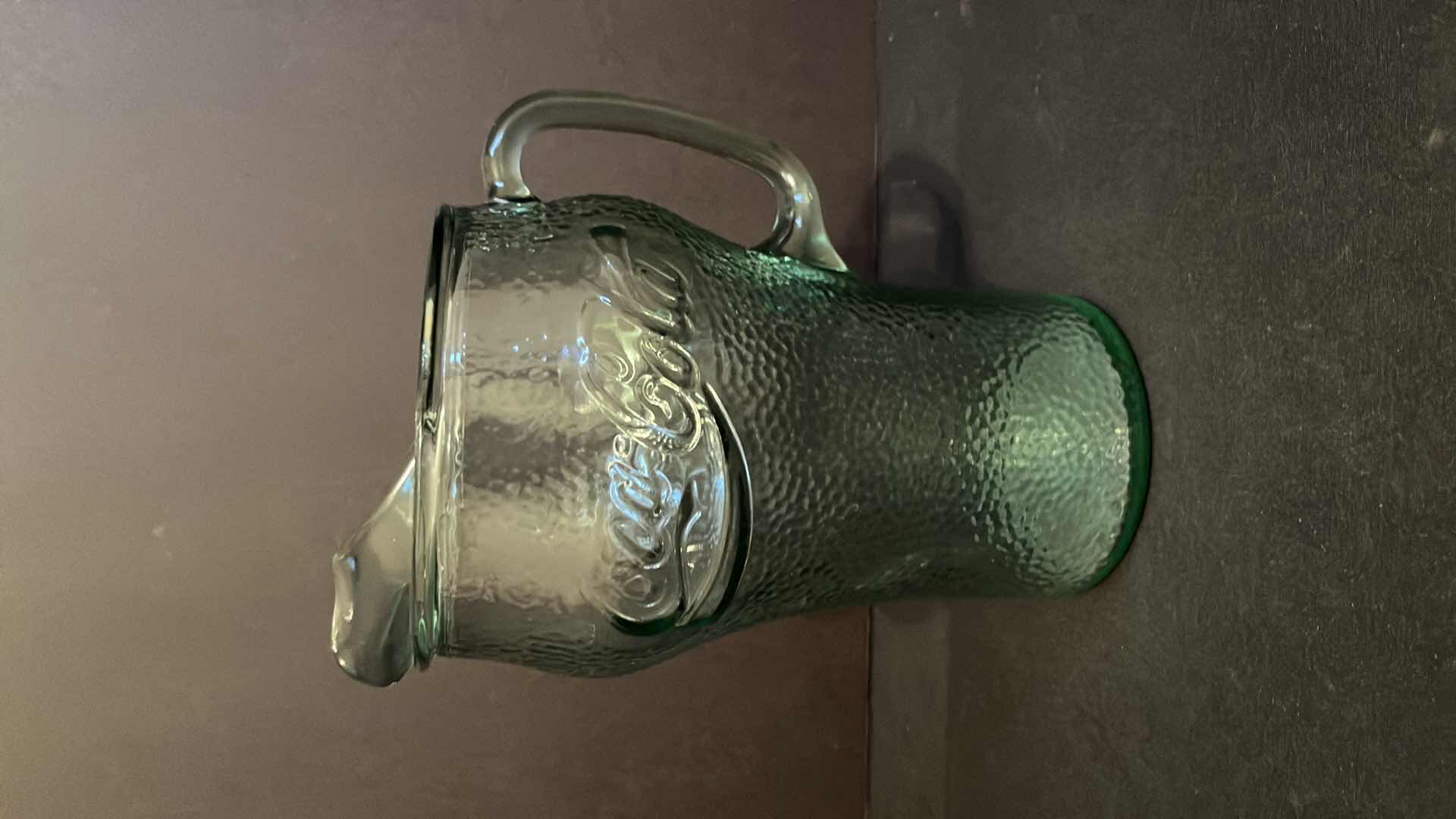 Photo 1 of COCA-COLA GREEN PEBBLE GLASS 64 OZ PITCHER