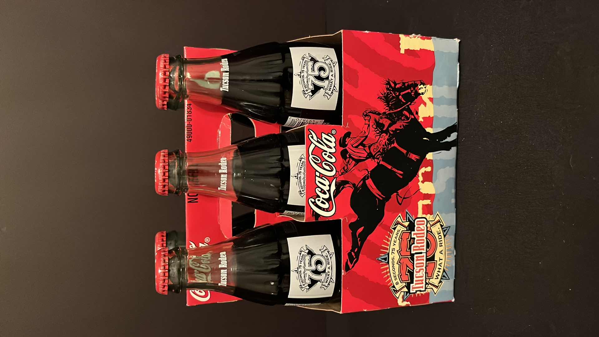 Photo 1 of COCA-COLA COMMEMORATIVE 6-PACK 8 OZ BOTTLES TUCSON RODEO 75TH ANNIVERSARY UNOPENED, 2000