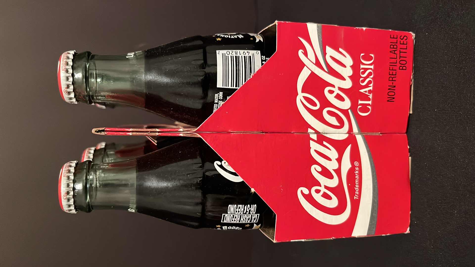 Photo 3 of COCA-COLA COMMEMORATIVE 6-PACK 8 OZ BOTTLES NATIONAL FINALS RODEO 40TH ANNIVERSARY LAS VEGAS UNOPENED, 1998