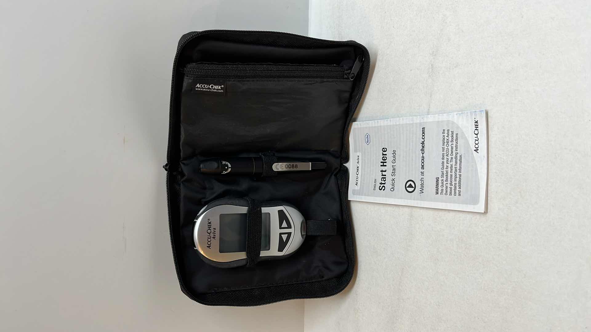 Photo 1 of ACCU-CHEK AVIVA BLOOD GLUCOSE METER AND LANCING DEVICE, BATTERY OPERATED (CAT/TYP 05911958002/53544465737)