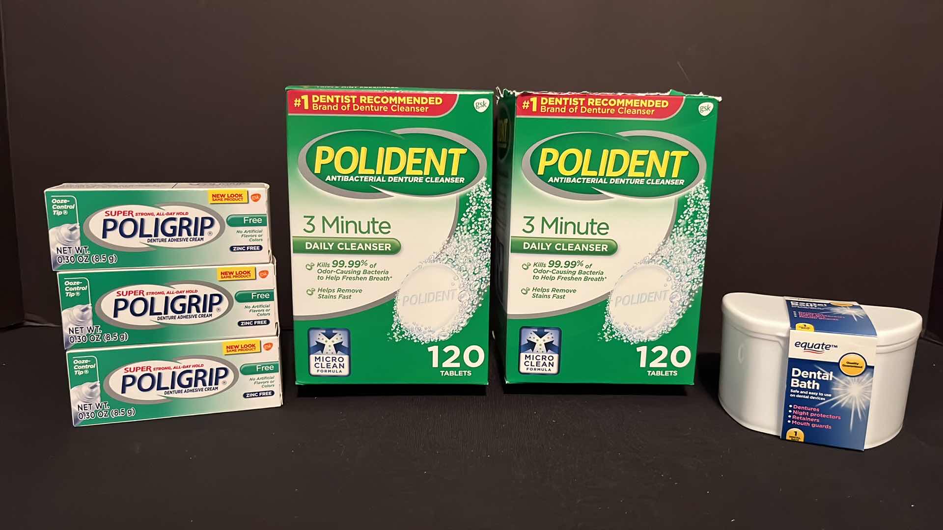 Photo 1 of POLIDENT ANTIBACTERIAL DENTURE CLEANSER TABLETS (1 FULL BOX, 1 HALF BOX), 3-SUPER POLIGRIP DENTURE ADHESIVE CREAM (.30 OZ) & NIP DENTAL BATH CONTAINER