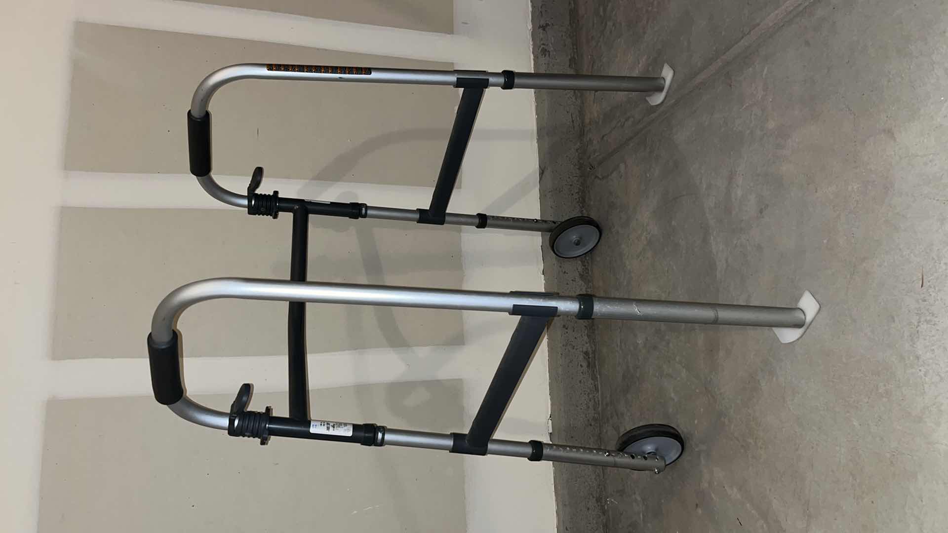 Photo 1 of INVACARE FOLD-UP WALKER W WEIGHT CAPACITY 300 LBS (MODEL G6291)