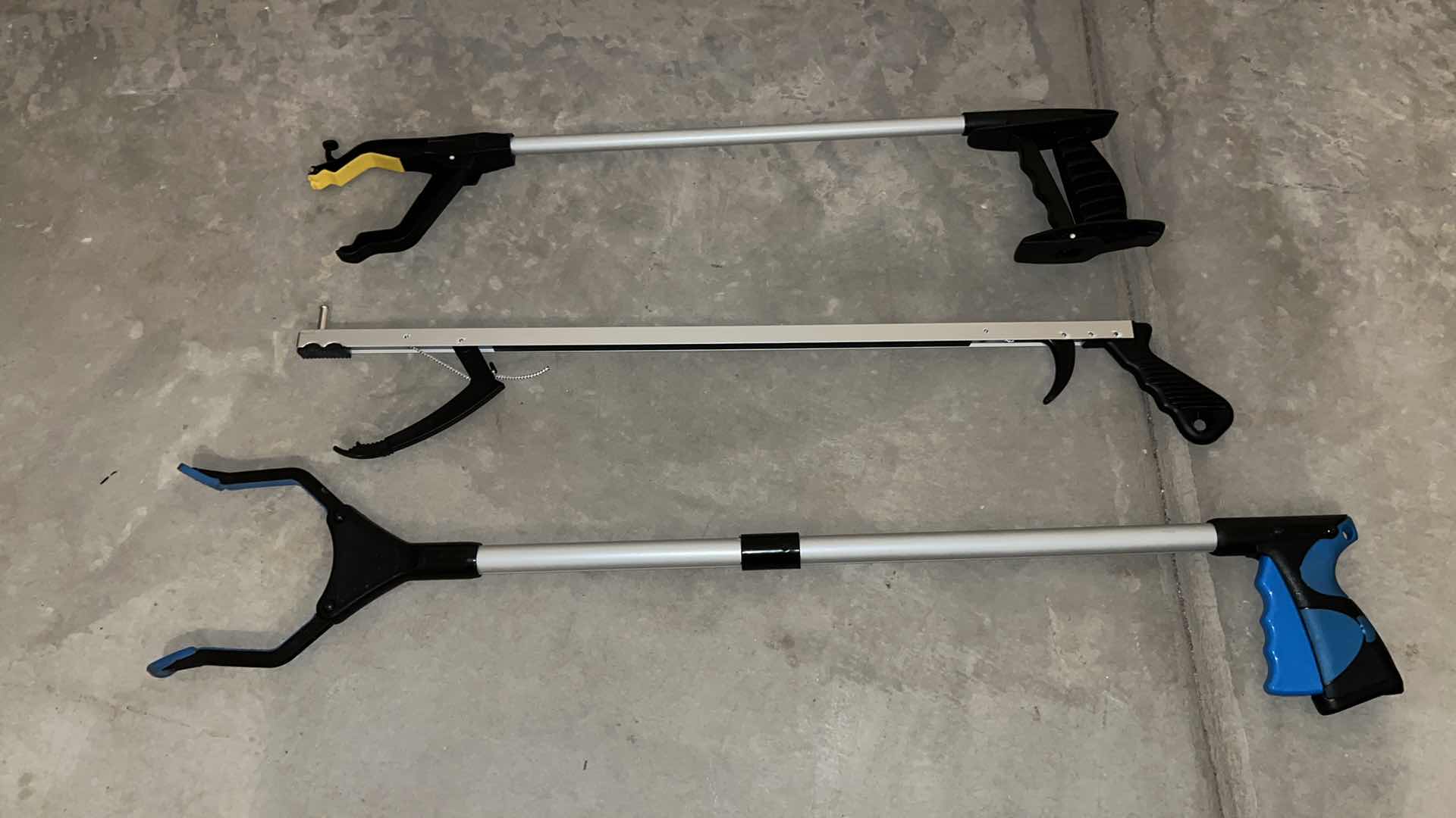Photo 2 of ADAPTIVE TOOLS FOR DISABLED, 3-MEDICAL REACHERS/GRIPPERS 24.5”-31.5”(TWO ARE MAGNETIC), DRESSING AID STICK & EASY SLIDER SHOEHORN 23.5”