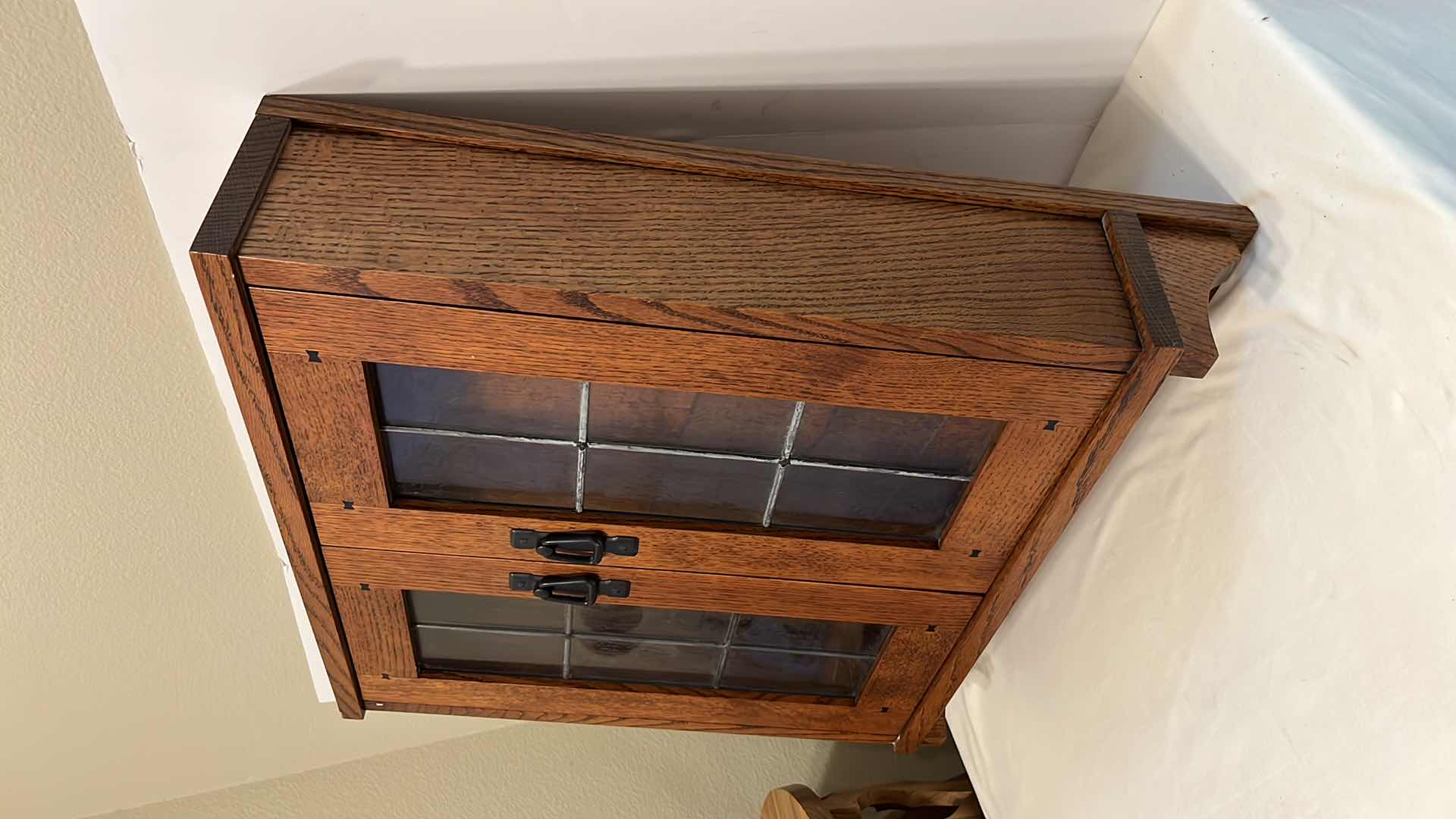 Photo 2 of MAHOGANY FINISH WOOD WALL CABINET W DISTORTED GLASS PANELS & GLASS SHELVES 5.5” X 23.5” H26”