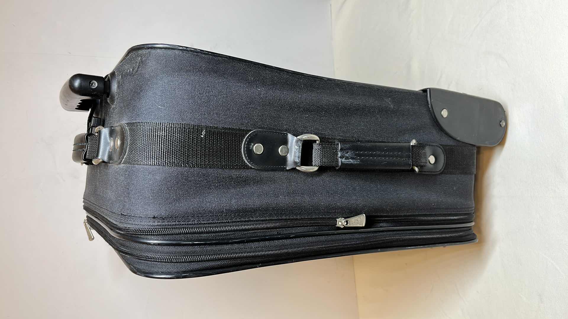 Photo 2 of CARRY-ON 20” LUGGAGE ON WHEELS