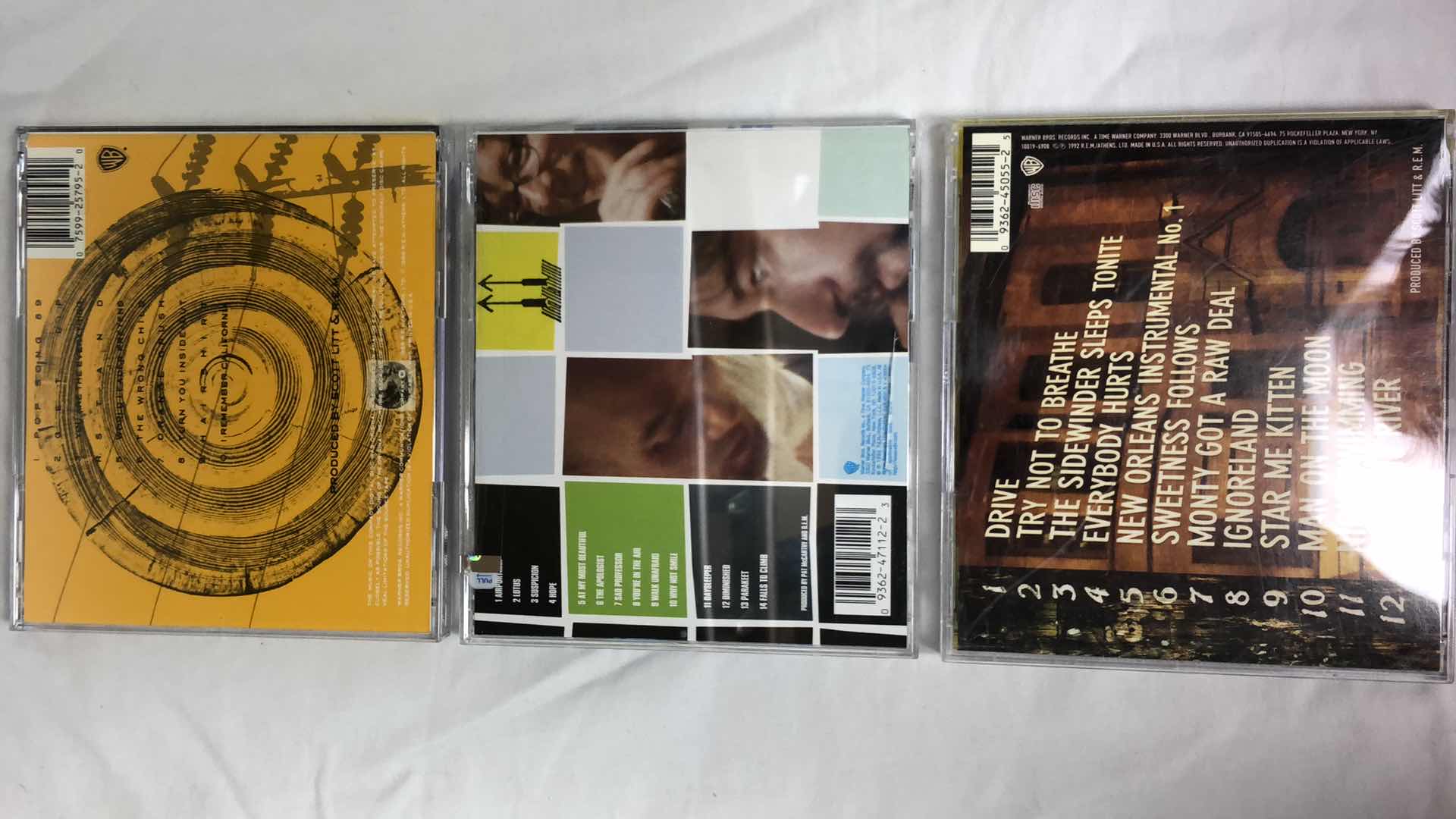 Photo 3 of ASSORTED REM ALBUM CDS (5)