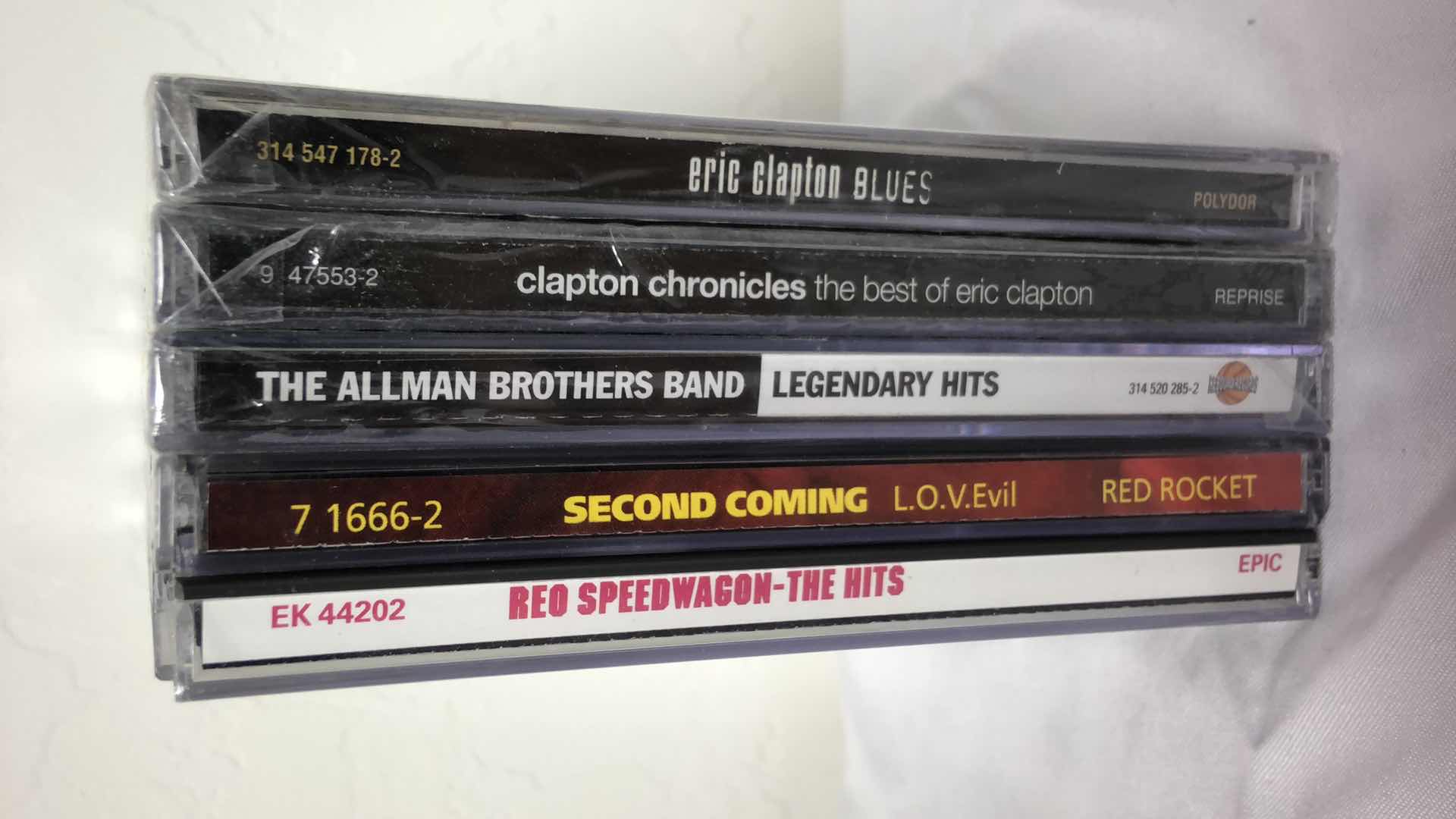 Photo 1 of ASSORTED MUSIC CDS ALLMAN BROTHERS, ERIC CLAPTON, REO SPEEDWAGON (5)