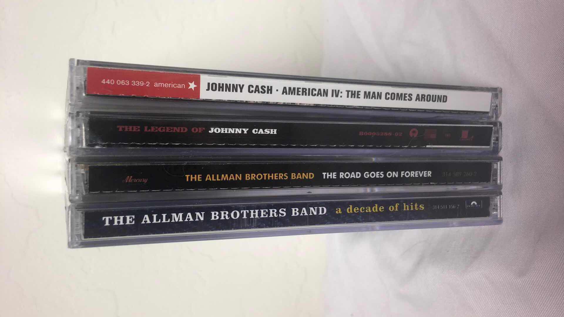 Photo 1 of ASSORTMENT OF JOHNNY CASH & ALLMAN BROTHERS ALBUM CDS (4)